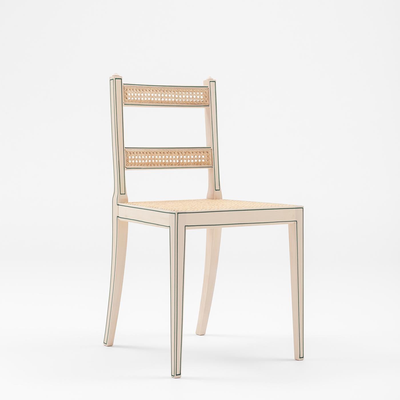 A contemporary interpretation of antique Northern European chairs, this chair boasts a simple aesthetic marked by elegant and refined details. Handcrafted of beechwood finished in a delicate natural shade, it features a sophisticated open backrest
