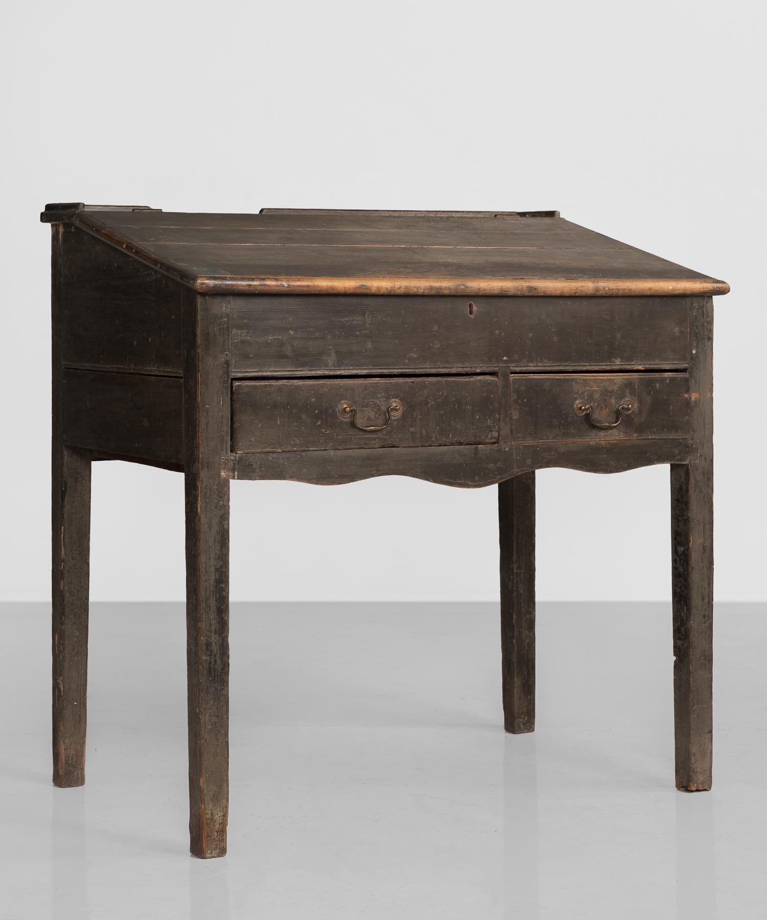 North county pine illustrators desk, England, circa 1880

Simple pine desk in original period paint, with decorative apron and storage under desktop.