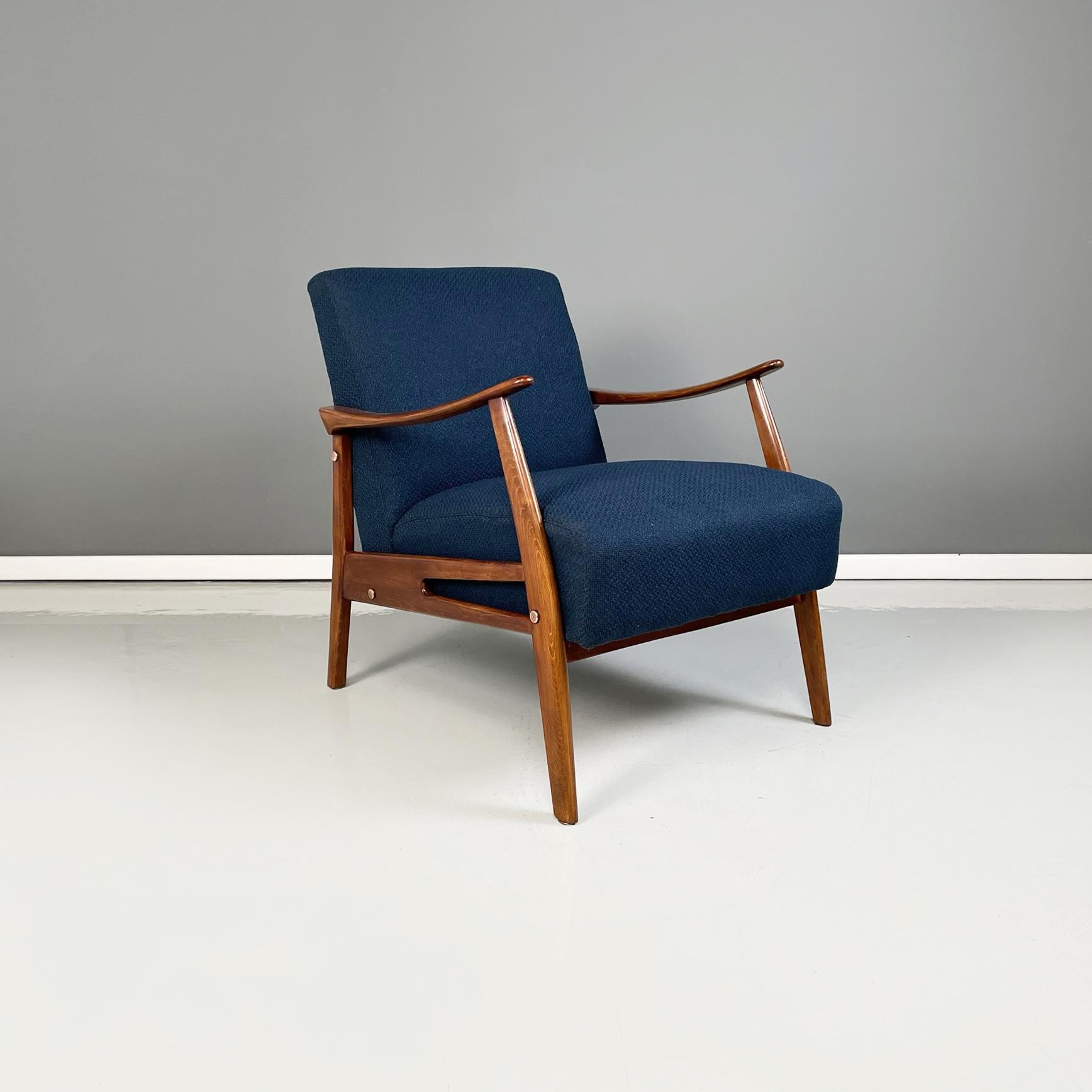 North Europa Mid-Century Modern Armchairs in blue fabric and beech solid wood, 1960s
Pair of fantastic and elegant armchairs with squared seat and squared backrest, completely upholstered in blue fabric. The structure is in beech solid wood with