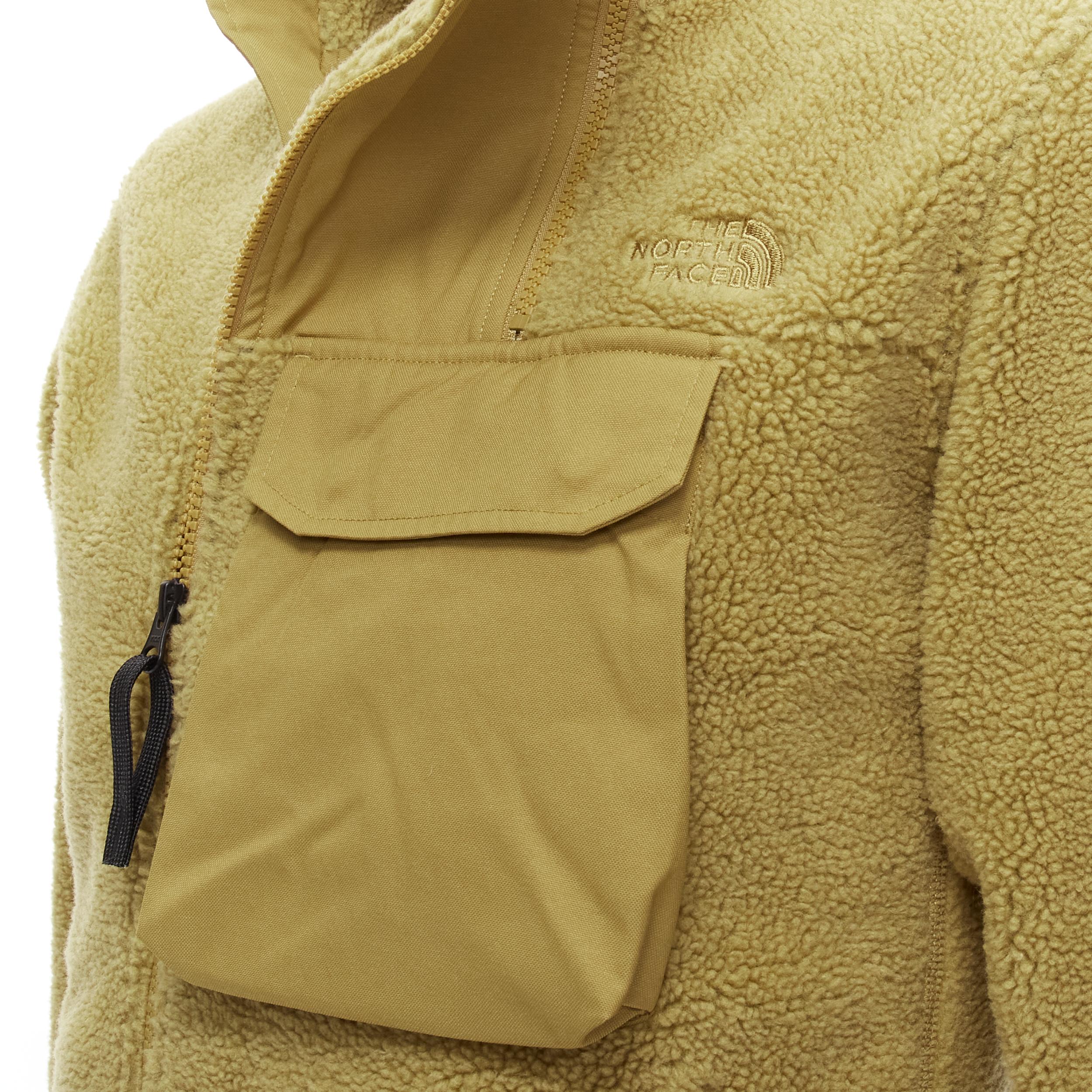 NORTH FACE tan brown fleece patch flap pocket asymmetric zip up jacket XS S 
Reference: CRTI/A00538 
Brand: The North Face 
Material: Fleece 
Color: Brown 
Pattern: Solid 
Closure: Zip 
Extra Detail: US XS / Asia S 
Made in: Cambodia 

CONDITION: