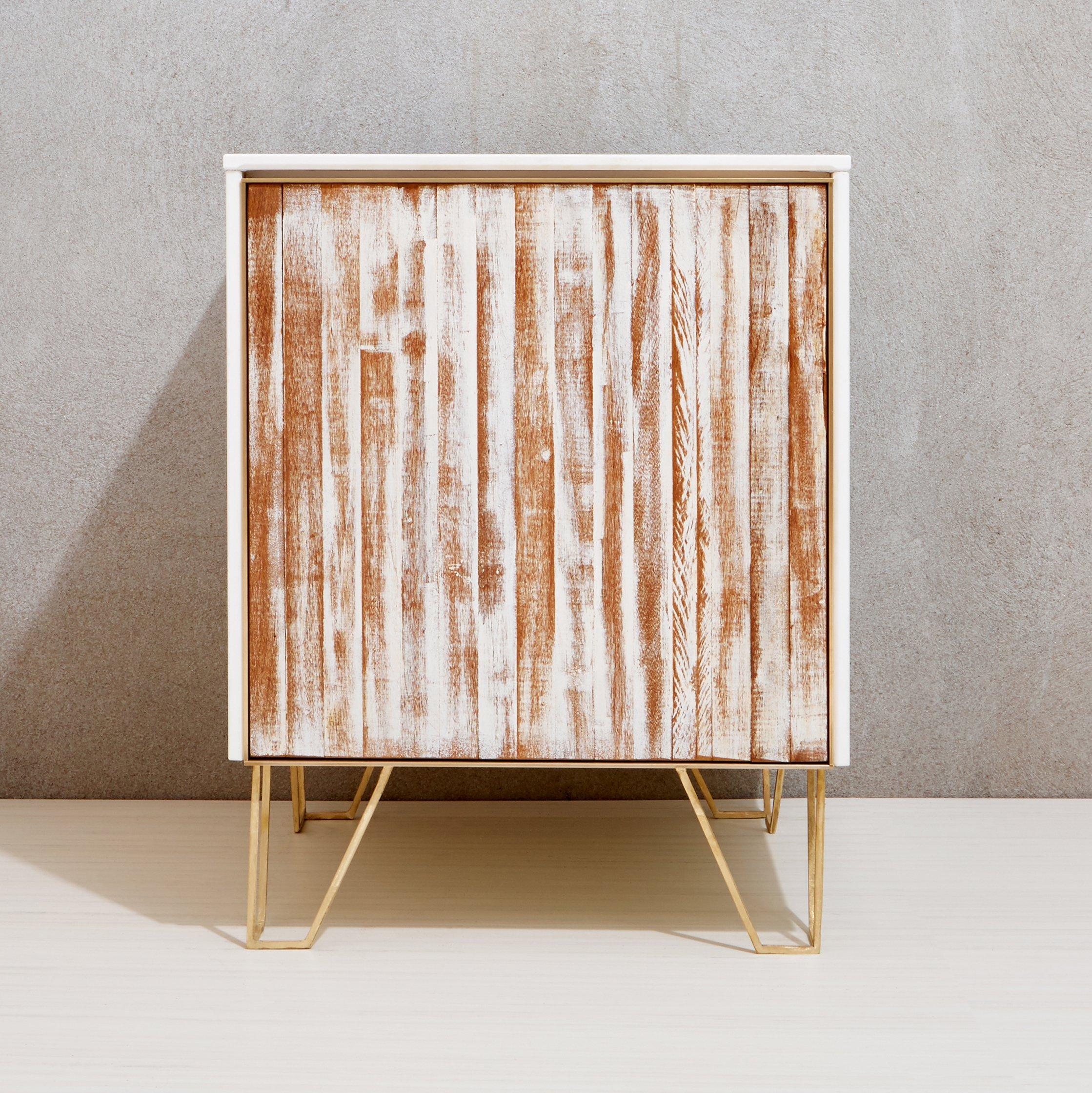 Clean lines of modern materials seamlessly mesh with distressed hardwood in this one of a kind furniture piece. Floating effortlessly atop our handcrafted brass legs the soft matte finish of the exterior panels frame a rich history within the