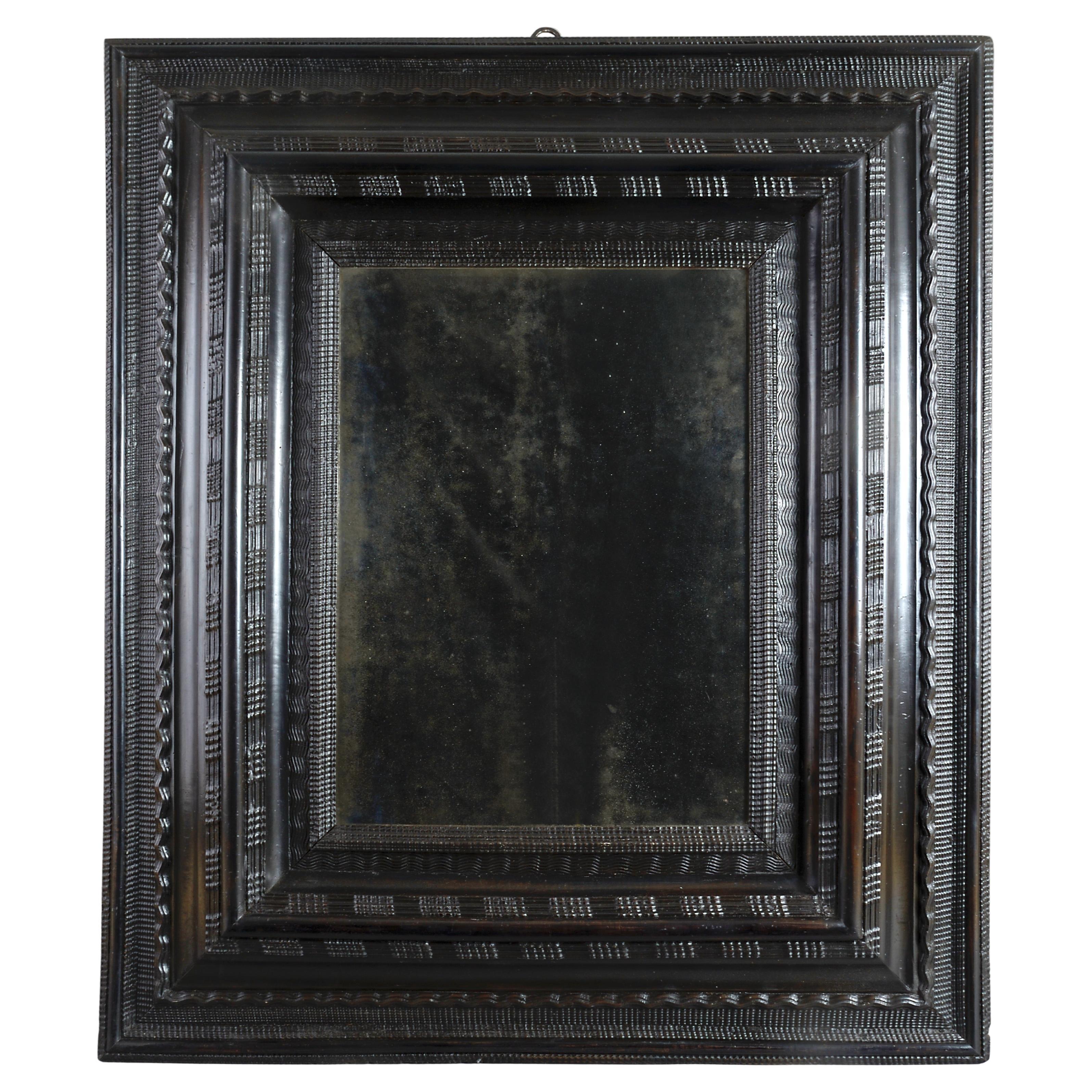 North Italian Ebonised Ripple-Moulded Mirror
