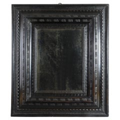 North Italian Ebonised Ripple-Moulded Mirror