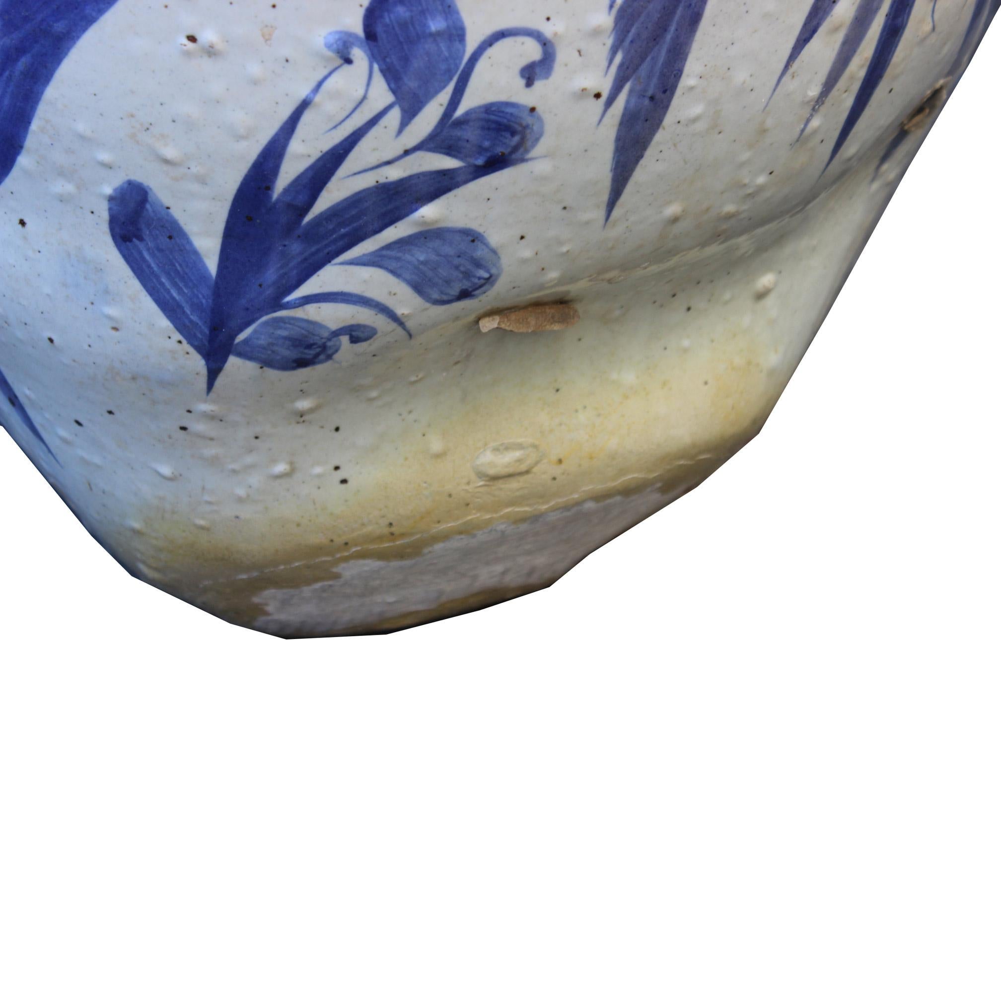 Unusual North Korean blue and white jar was used to store rice. Large hand painted fish symbolizes prosperity and good fortune. Chosun dynasty, circa 1900s.

   