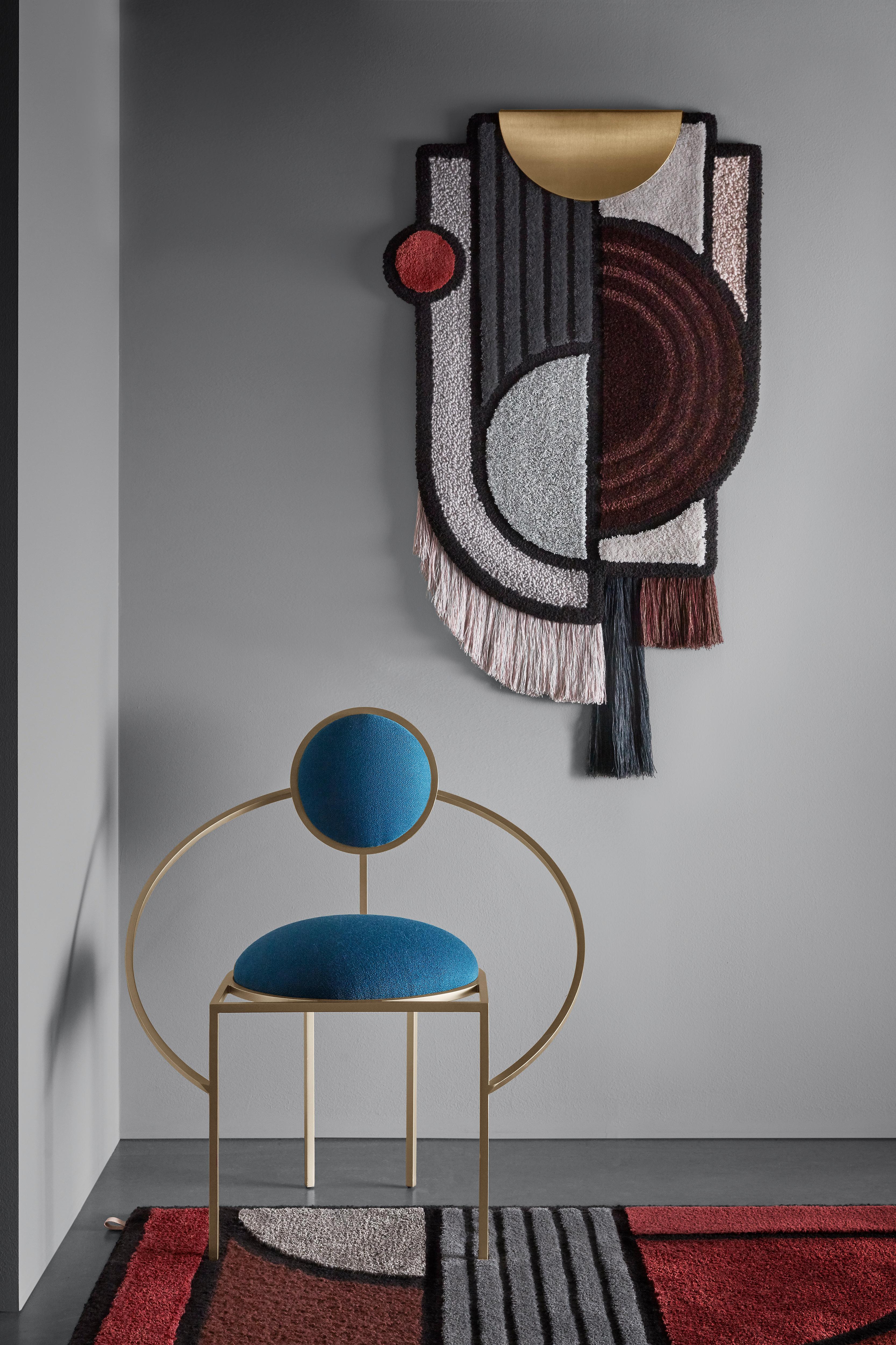 A hand tufted wallhanging in pure wool with an element of linen and fringes in 100% pure linen. As one would expect, the names derive from the semicircular (North Pole) and rectangular (South Pole) crest of blonde brass, below which bold lines of