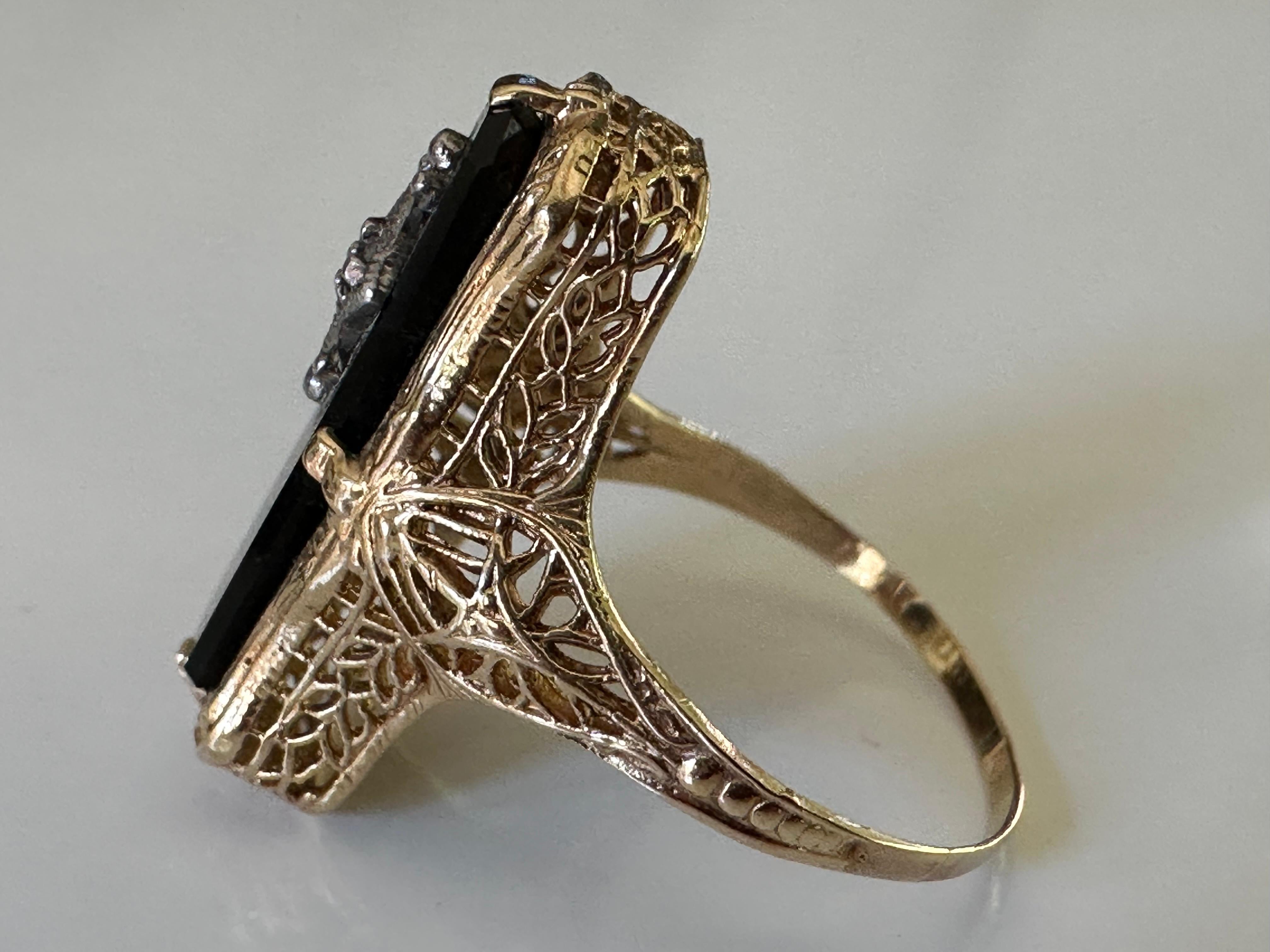 Brilliant Cut North-South Onyx and Diamond Filigree Ring