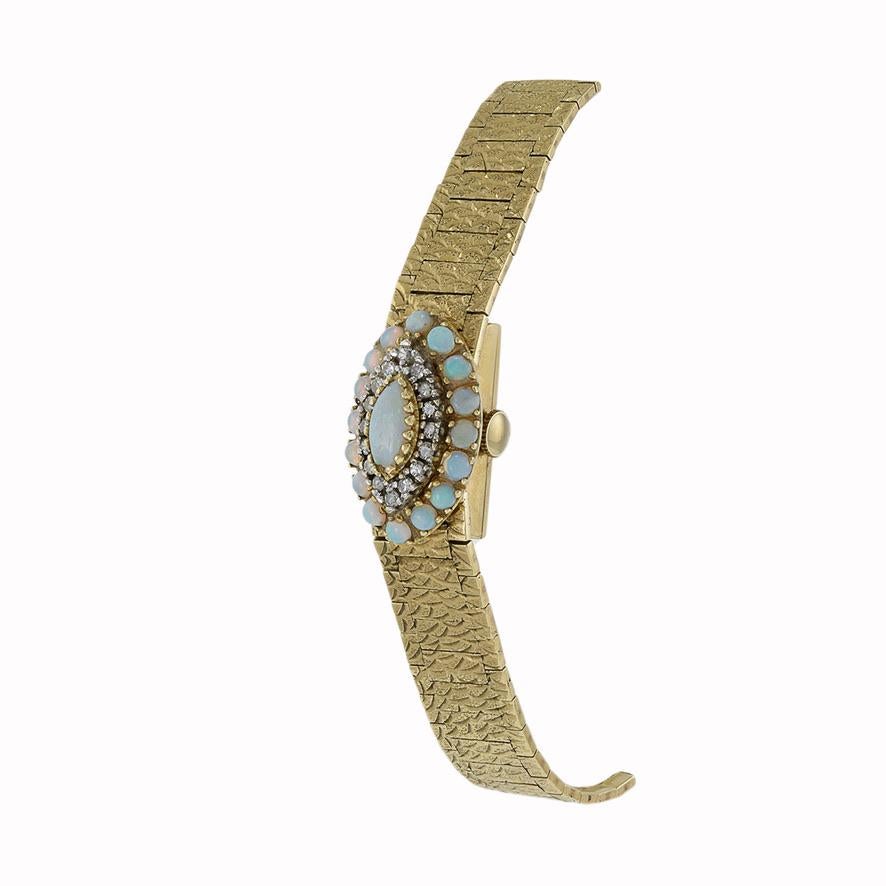North Star Cocktail Watch 14K Yellow Gold Diamonds and Opals In Good Condition For Sale In New York, NY