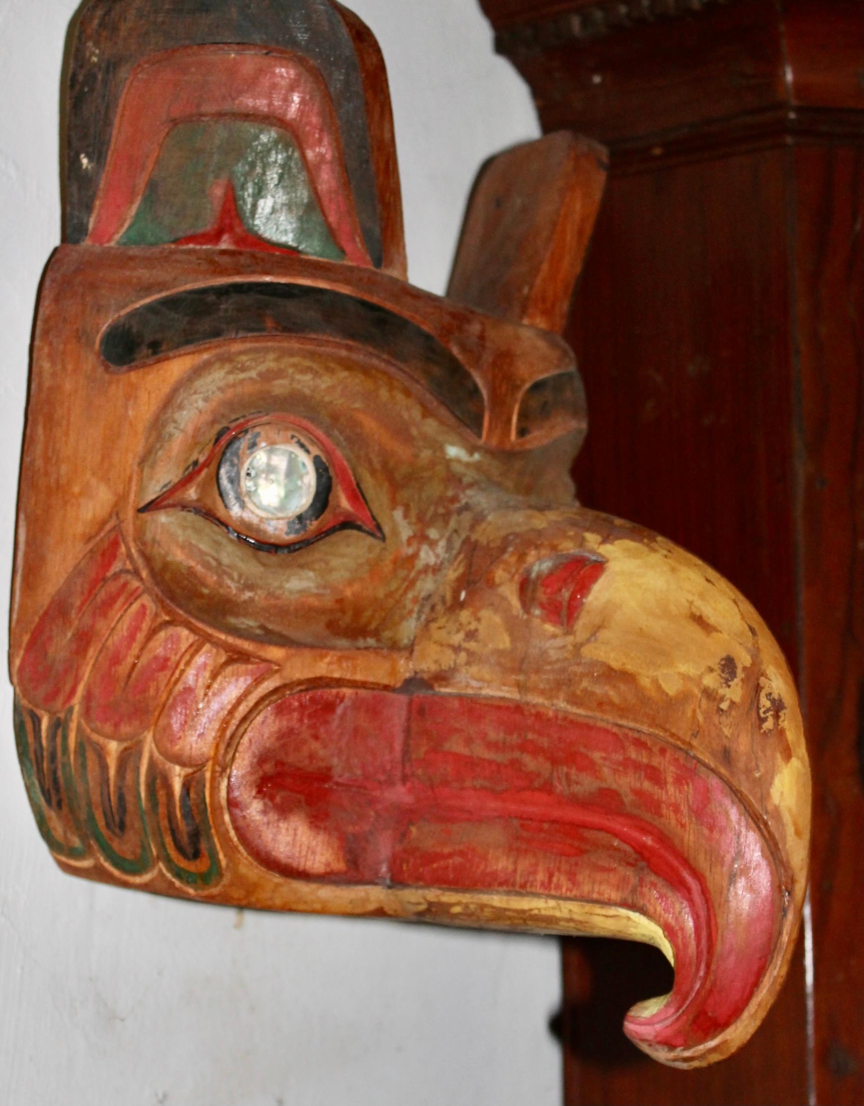 A beautiful colorful and intense North West Coast Raven Mask. Colors faded and oxidized by age. Eyes are actually abalone buttons.
