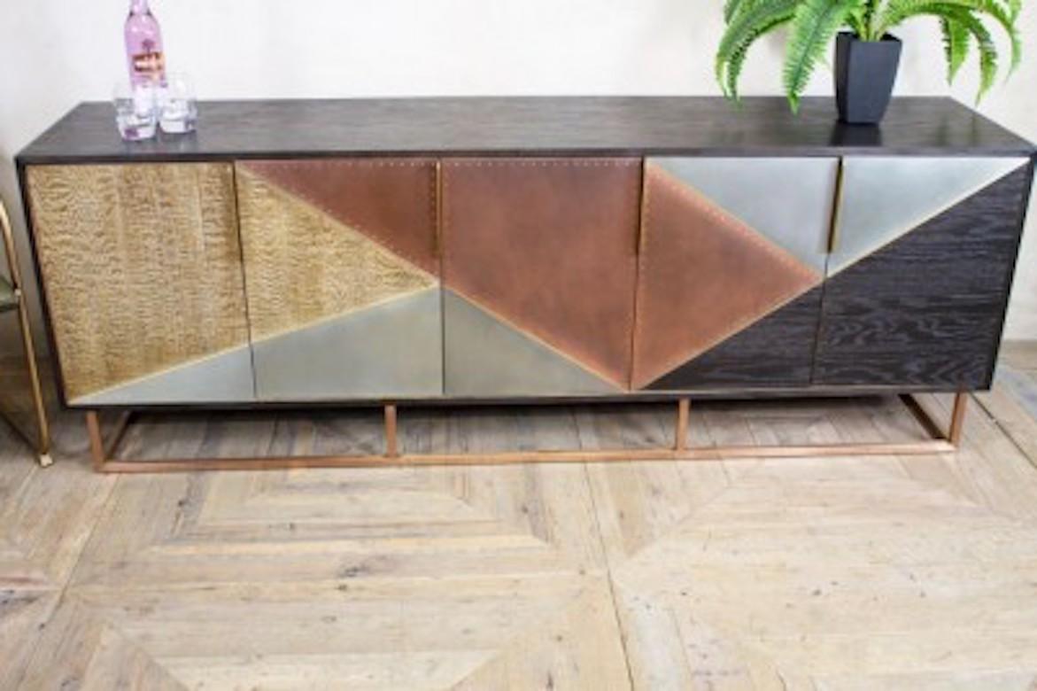 A fine Northcliff Mid-Century Modern sideboard, 20th century.

Bring style and storage to your space with the ‘Northcliffe’ Mid-Century Modern sideboard.

The ‘Northcliffe’ has an aged oak exterior and aged oak panels, with a brushed brass or