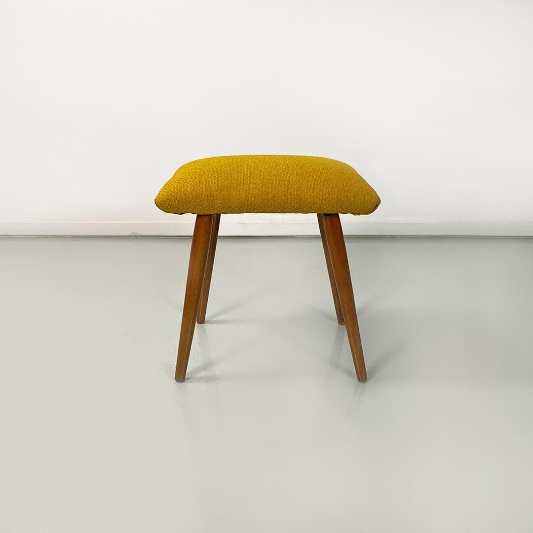 Northern European Mid-Century Modern yellow fabric and beech pouf or footrest, 1960s
Pouf or footrest of northern European origin, with a rectangular seat, padded and upholstered with new yellow cotton and with round section solid beech
