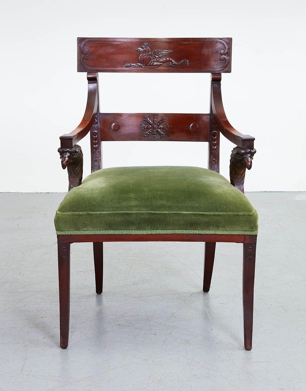 Fine early 19th mahogany neoclassical armchair, possibly designed by Carl Freidrich Schinkel, the crest rail with carved griffin, the arms having carved and faux patinated bronze eagle supports and standing on sweeping saber legs, the whole with