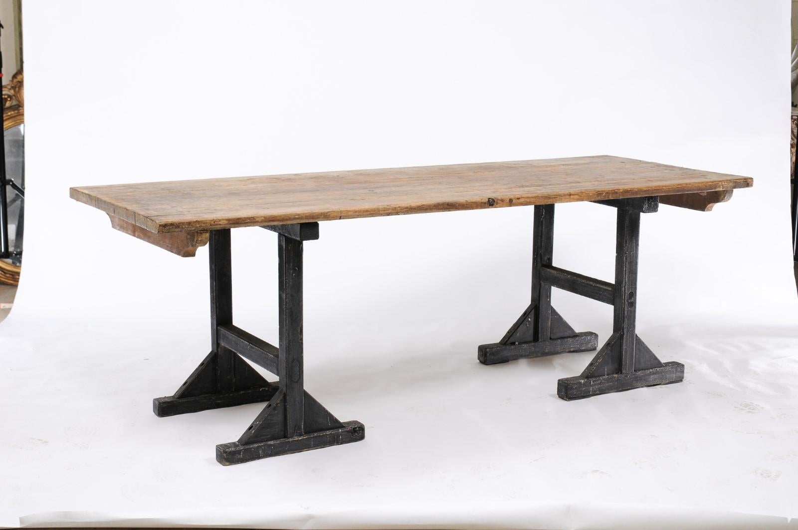 20th Century Northern French Long Pine Work Table with Black-Painted Trestle Base, circa 1920