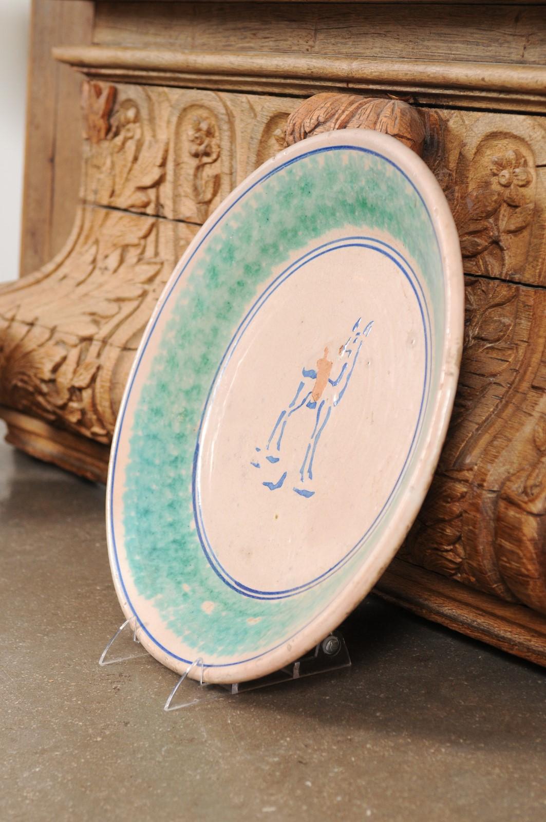 Painted Northern Italian 1910s Pottery Platter with Blue Deer Motif and Weathered Patina For Sale