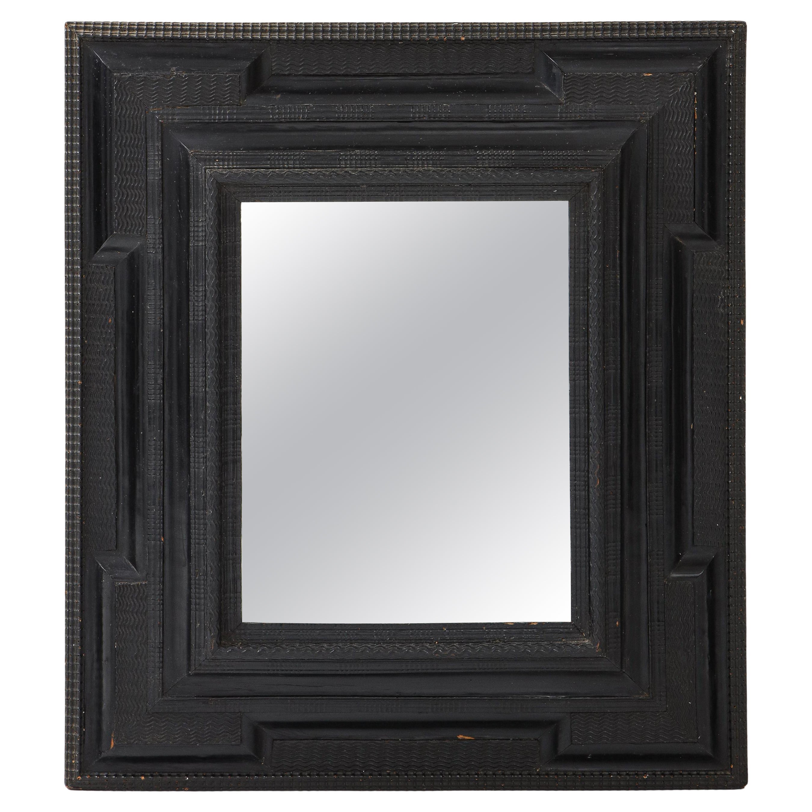 Northern Italian Baroque Ebonized Frame Mirror, Hand-Carved, 1660-80