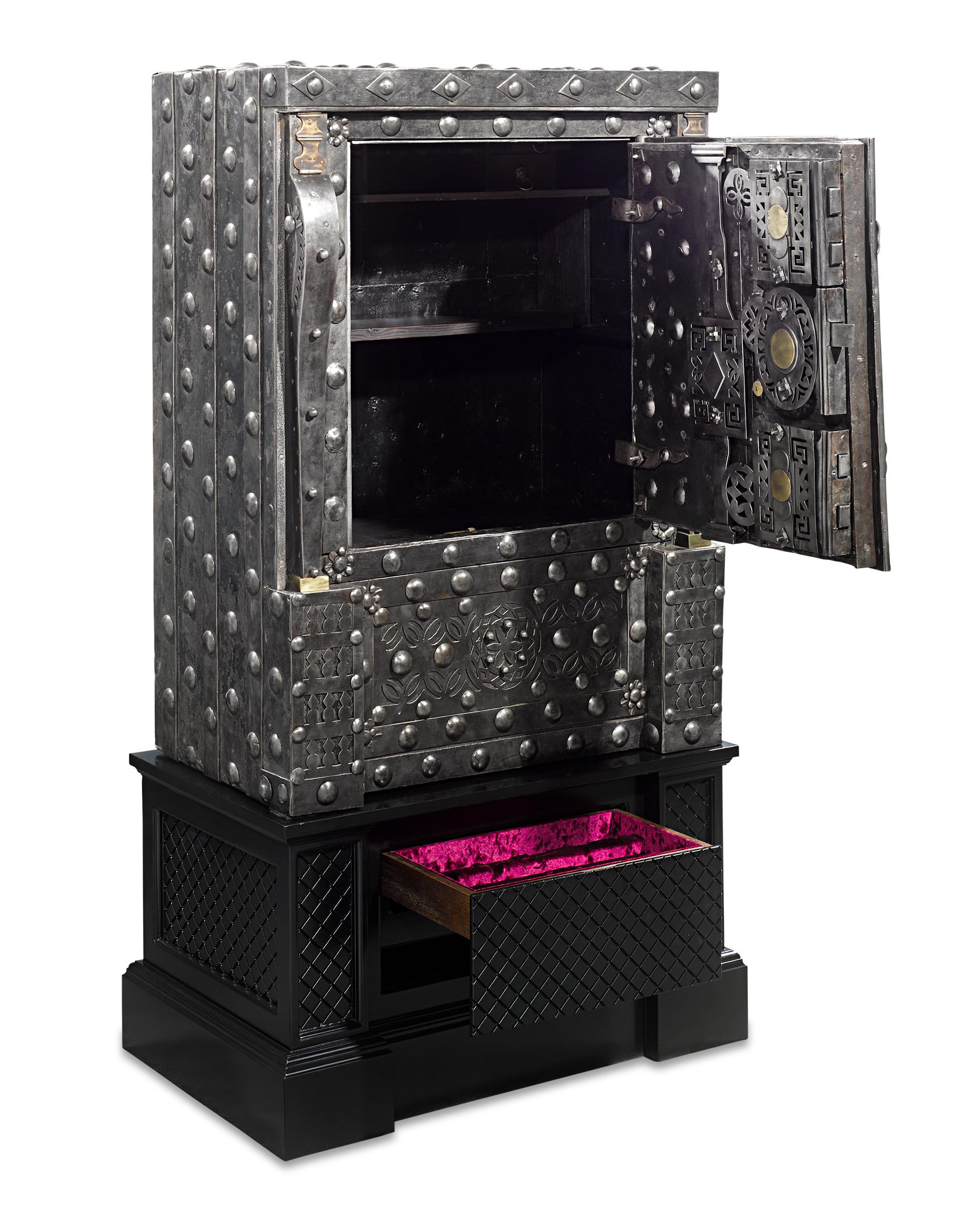 A pièce de résistance of mechanical complexity and exceptional craftsmanship, this fully functioning Italian hobnail safe was once considered one of the most secure means by which valuables could be stored. It was crafted around the turn of the 19th