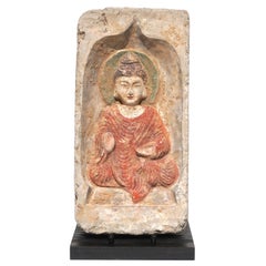 Escultura de terracota de un buda sentado de la dinastía Wei del Norte 386-534 d.C.