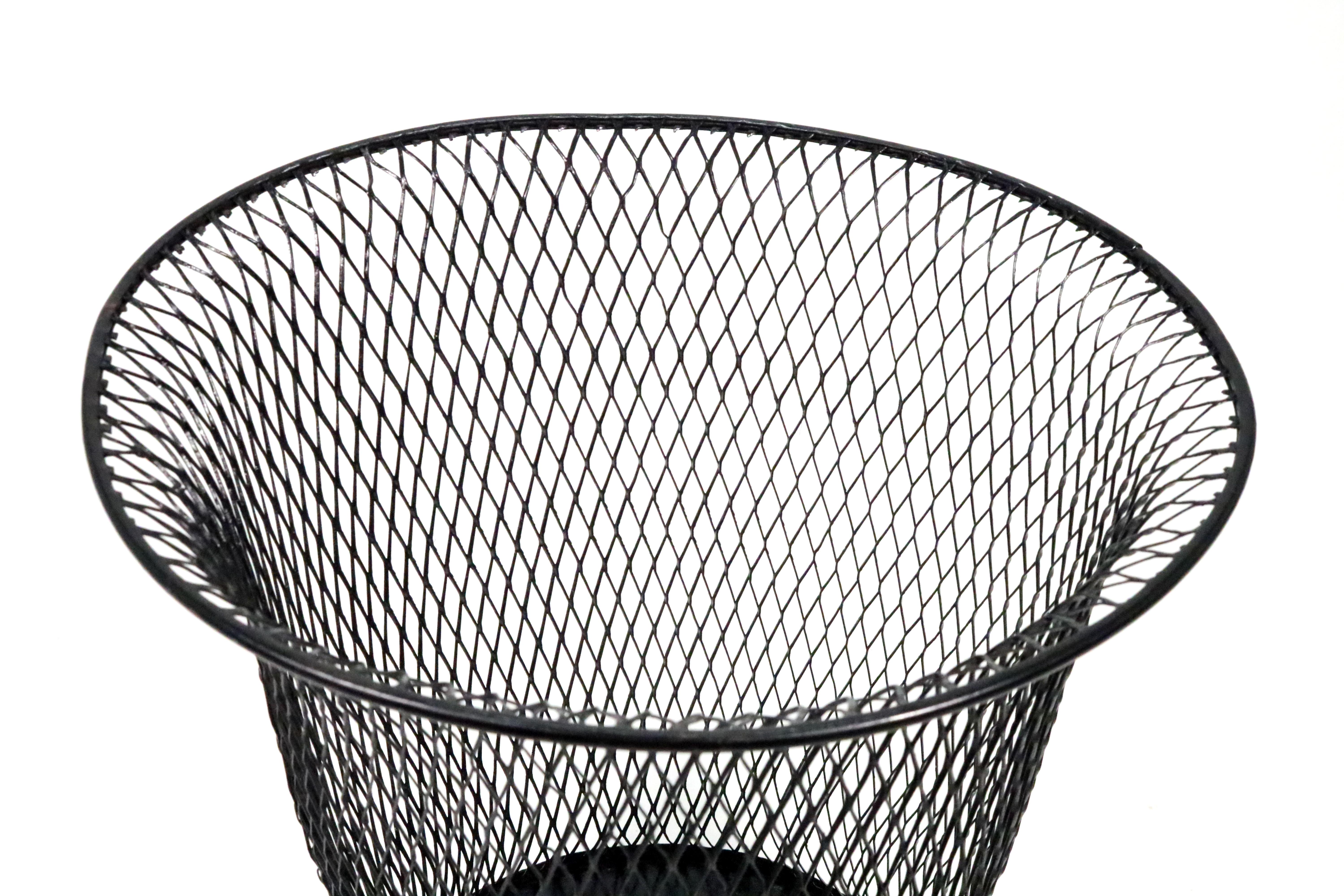 Wire mesh waste basket by Northwestern Expanded Metal Company. 

Stamped signature on the underside. Structurally sound and sturdy. No rust.