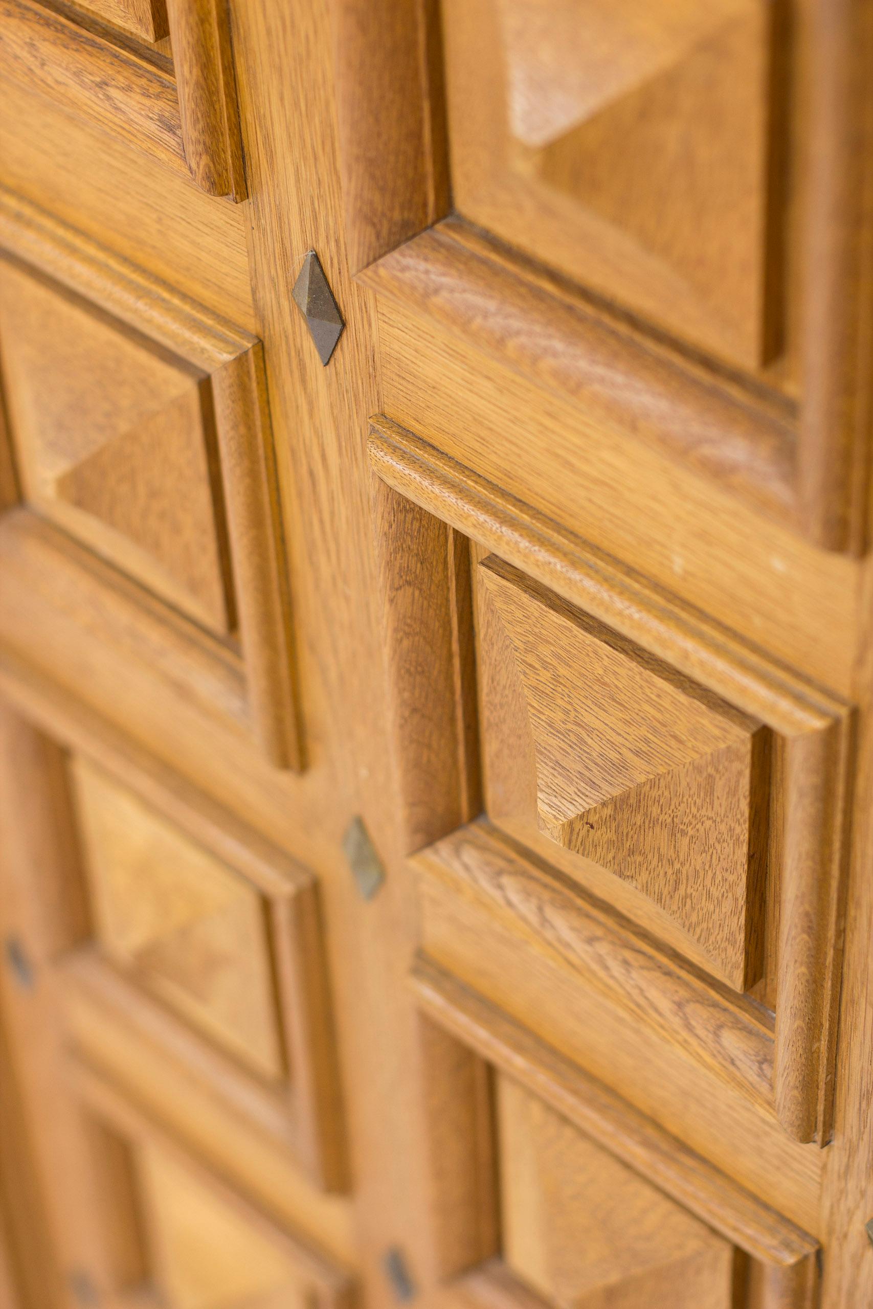 Early 20th Century Norwegian Art Deco Cabinet in oak with relief doors, Oscar Nilsson style For Sale