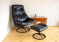Norwegian Black Leather Lounge Chair & Footstool Swivel Reclining Ekornes 1980s