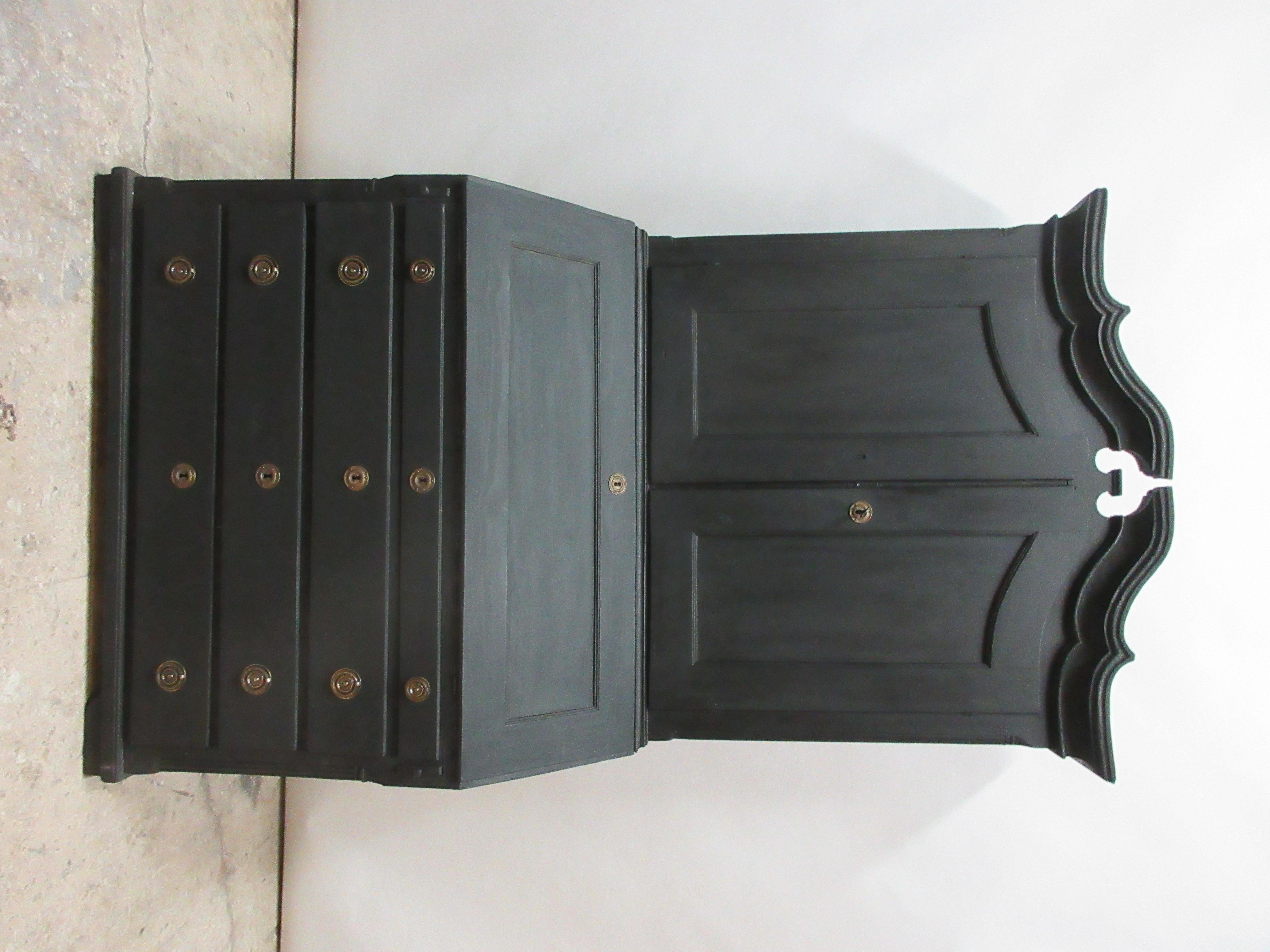 This is a Norwegian black secretary hutch, it has been restored and repainted with milk paints 