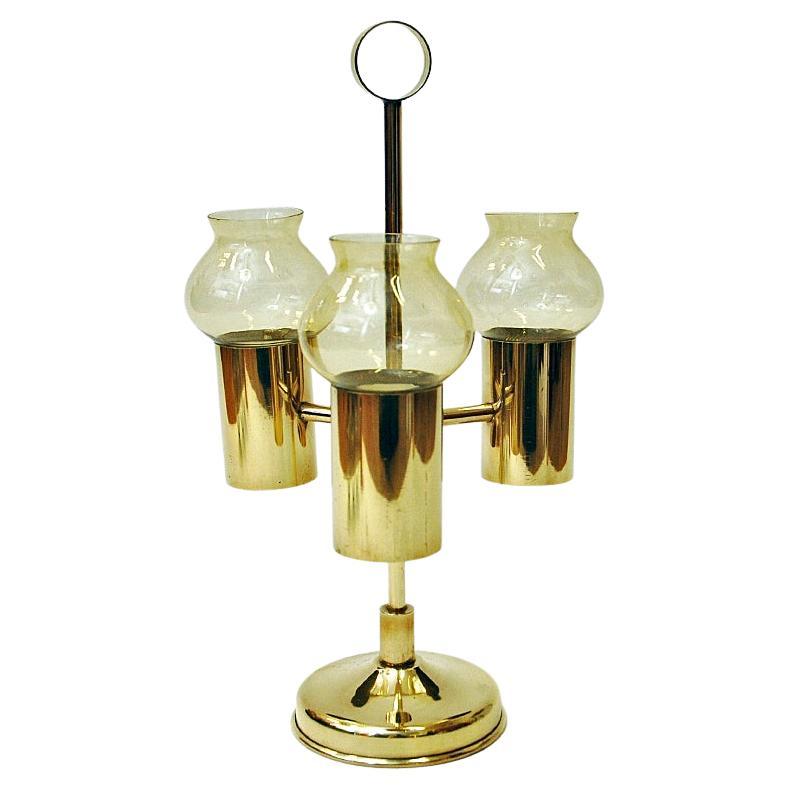 Norwegian Brass Candleholder with three arms and amber colored shades 1960s