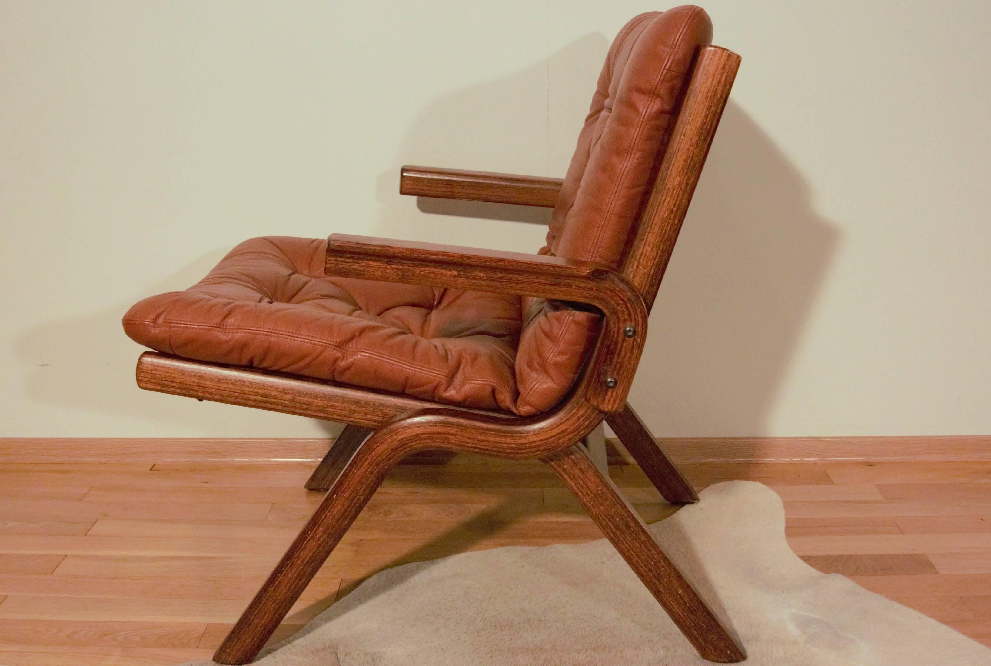 Norwegian Folding Uno chair in cognac leather, 1970s.

Useful as a fold away guest chair or a permanent addition the Norwegian Uno chair is a sturdy chair with a strong nylon hammock supporting the quality Norwegian leather cushion. The frame is