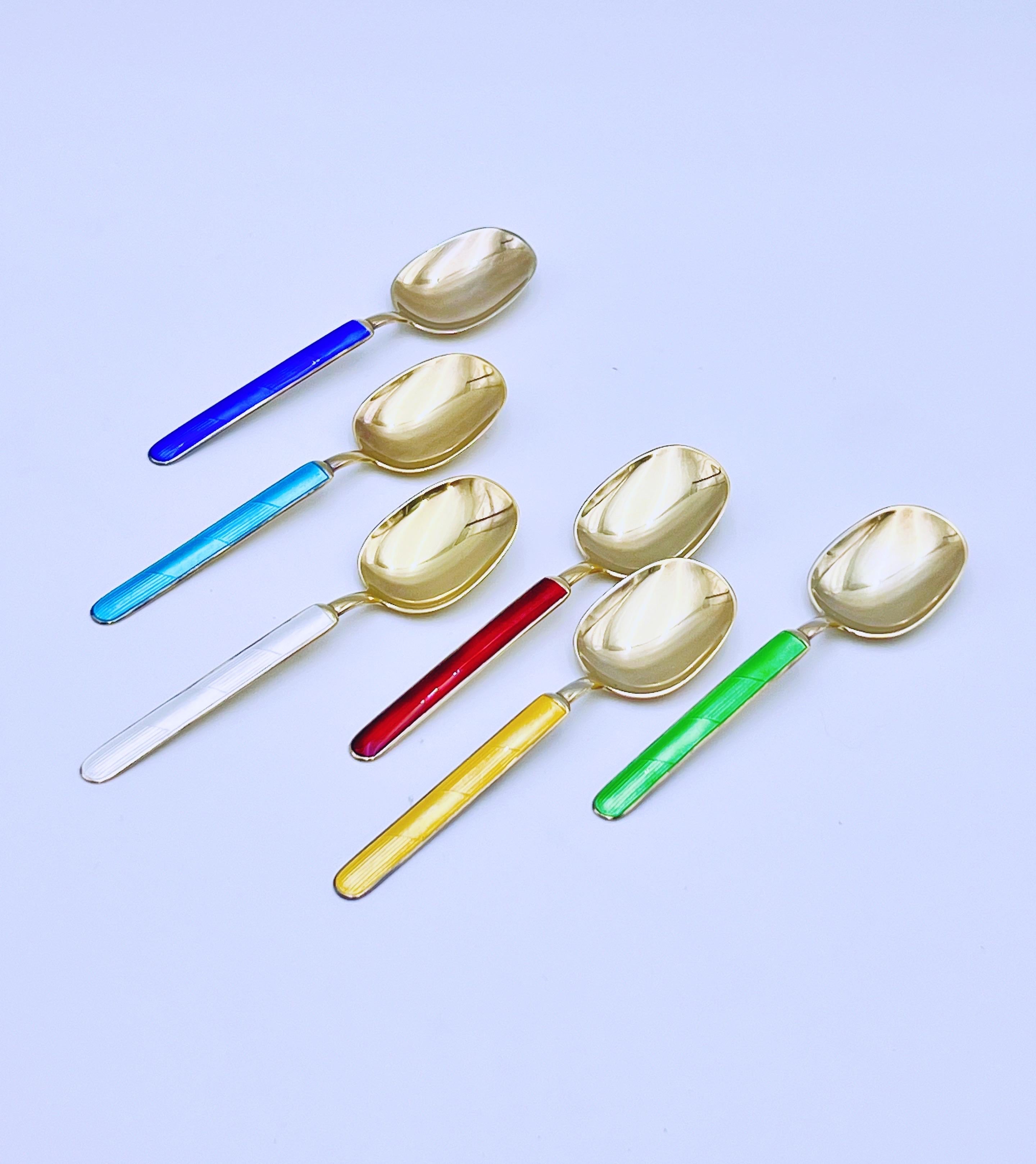 Luxury sterling silver and enamel with gold gilt / gold-plated decoration. Features six distinct colors of enamel. Designed and produced in Norway by Aksel Holmsen (1873–1962), circa 1960s.

Exquisite Norwegian / Scandinavian / Nordic mid-century