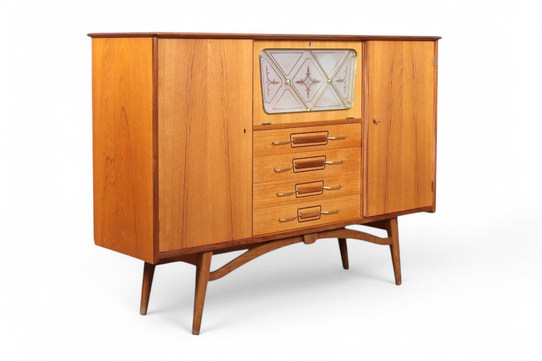 Origin: Norway
Designer: Arna Bruk
Manufacturer: Arna Bruk
Era: 1950s
Materials: Teak
Measurements: 59″ wide x 16.5″ deep x 41.25″ tall