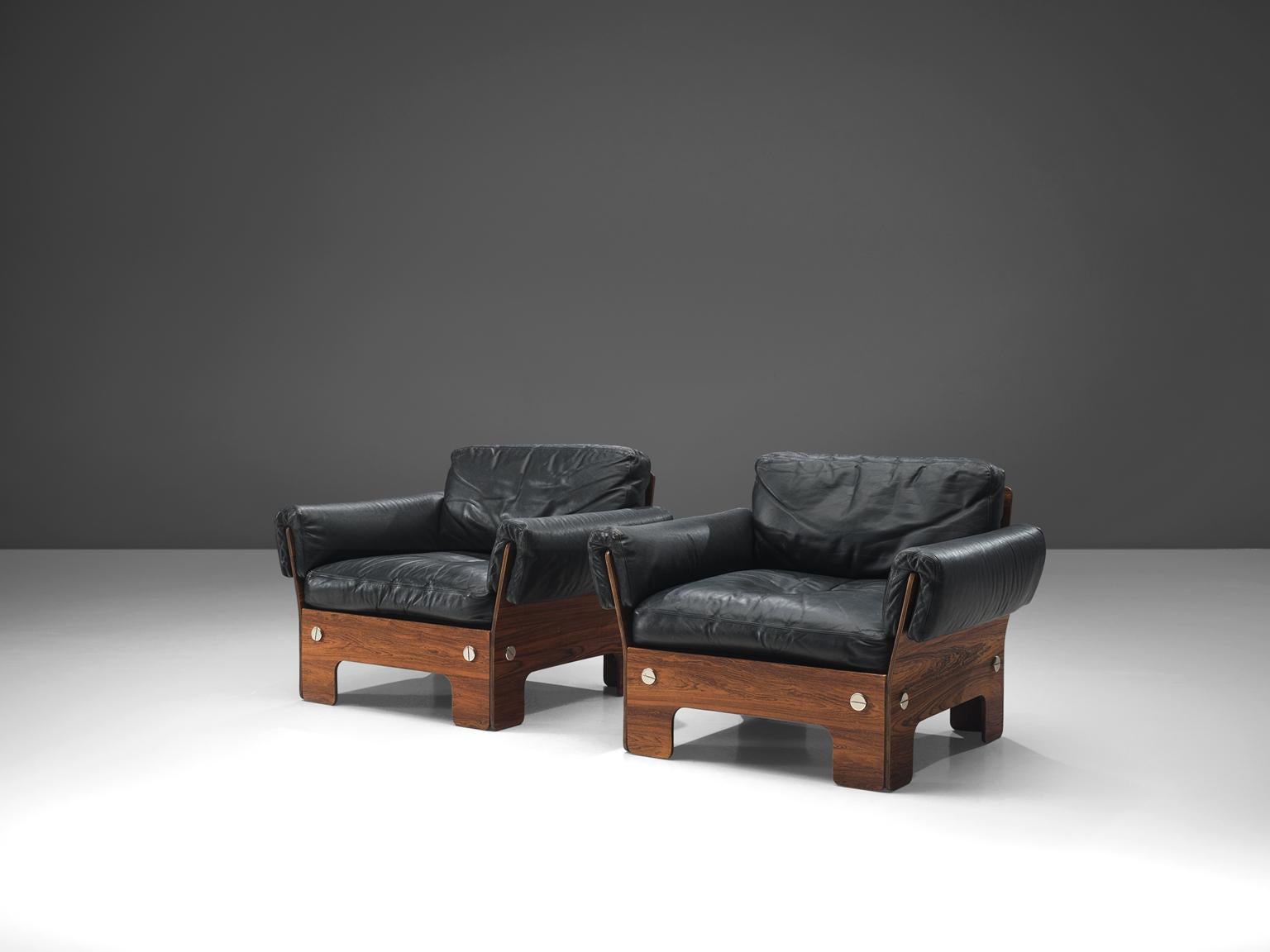 Scandinavian Modern Norwegian Lounge Chairs in Rosewood and Leather