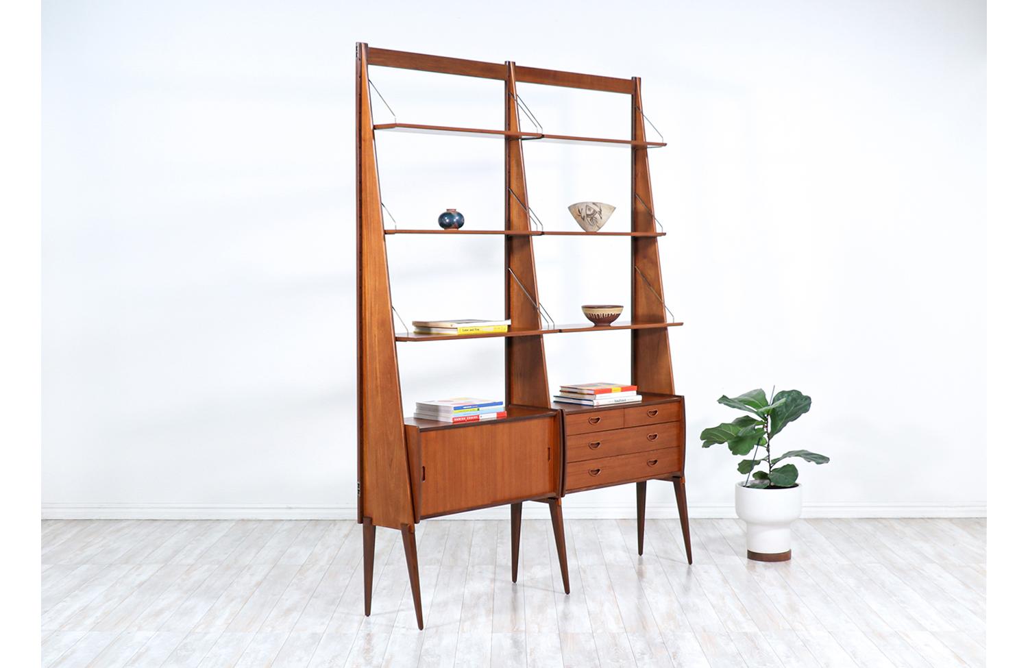 Norwegian modern free-standing modular teak bookshelf by Einar Raknes.