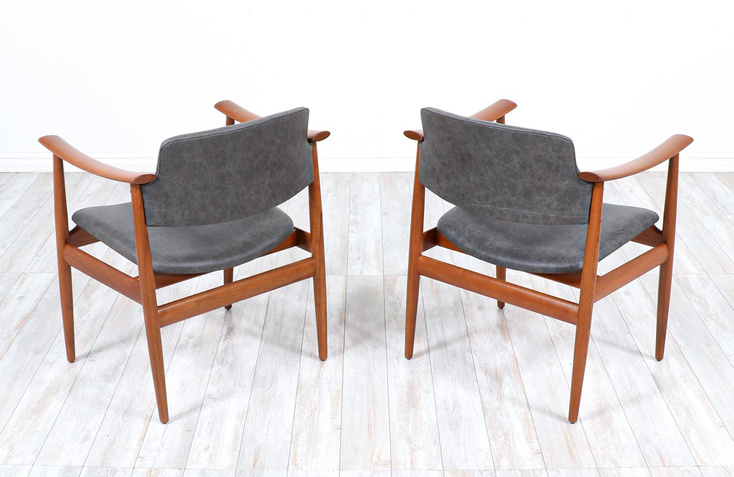 Norwegian Modern Sculpted Teak & Leather Arm Chairs by Gerhard Berg In Excellent Condition For Sale In Los Angeles, CA