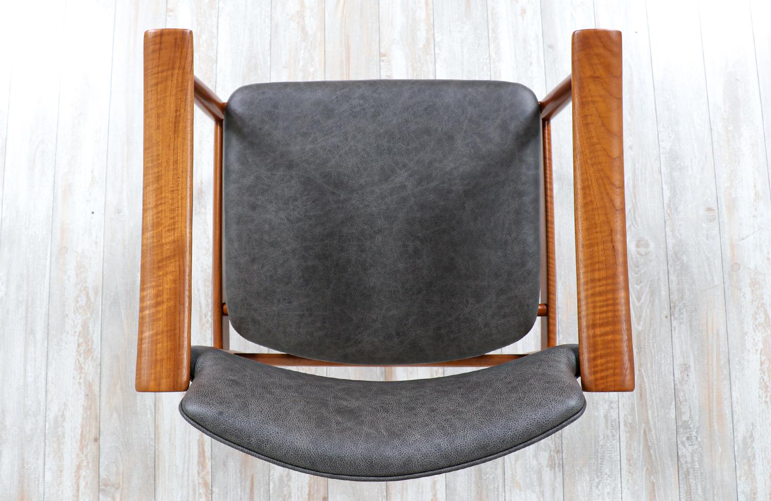 Mid-20th Century Norwegian Modern Sculpted Teak & Leather Arm Chairs by Gerhard Berg For Sale