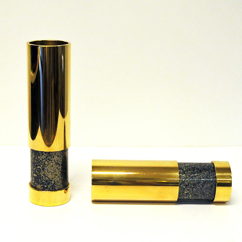 Two decorative Norwegian cylindrical brass and stone vases by Saulo AS in Sulitjelma, Norway. The vases have a padded fabric base underneath.
A Norwegian product from the 1970s with beautiful polished stone and brass on top and bottom. Measures: 18