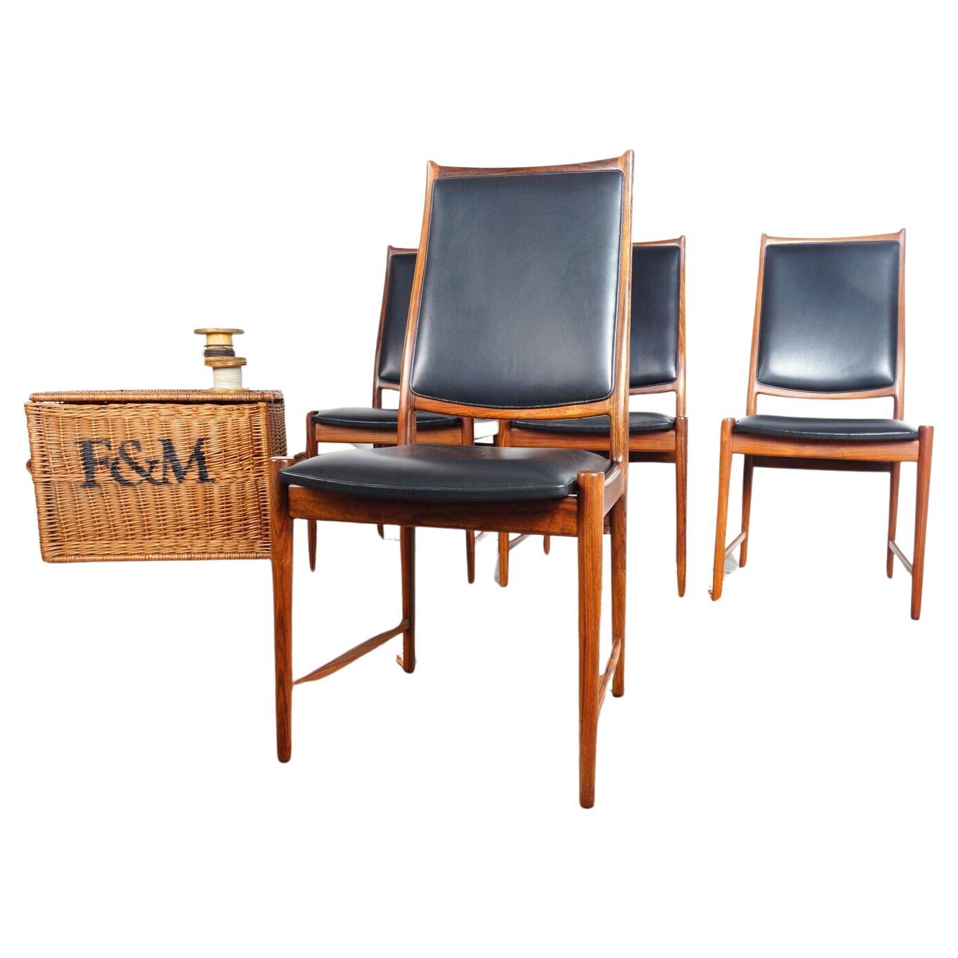 Set of Four Norwegian 60s 'Darby' Dining Chairs Designed by Torbjörn Afdal for Bruksbo

A set of four Norwegian sculpted Danish design Rosewood 'Darby' dining chairs, 
designed by Torbjörn Afdal for Bruksbo in the 1960s.

The rosewood's dark