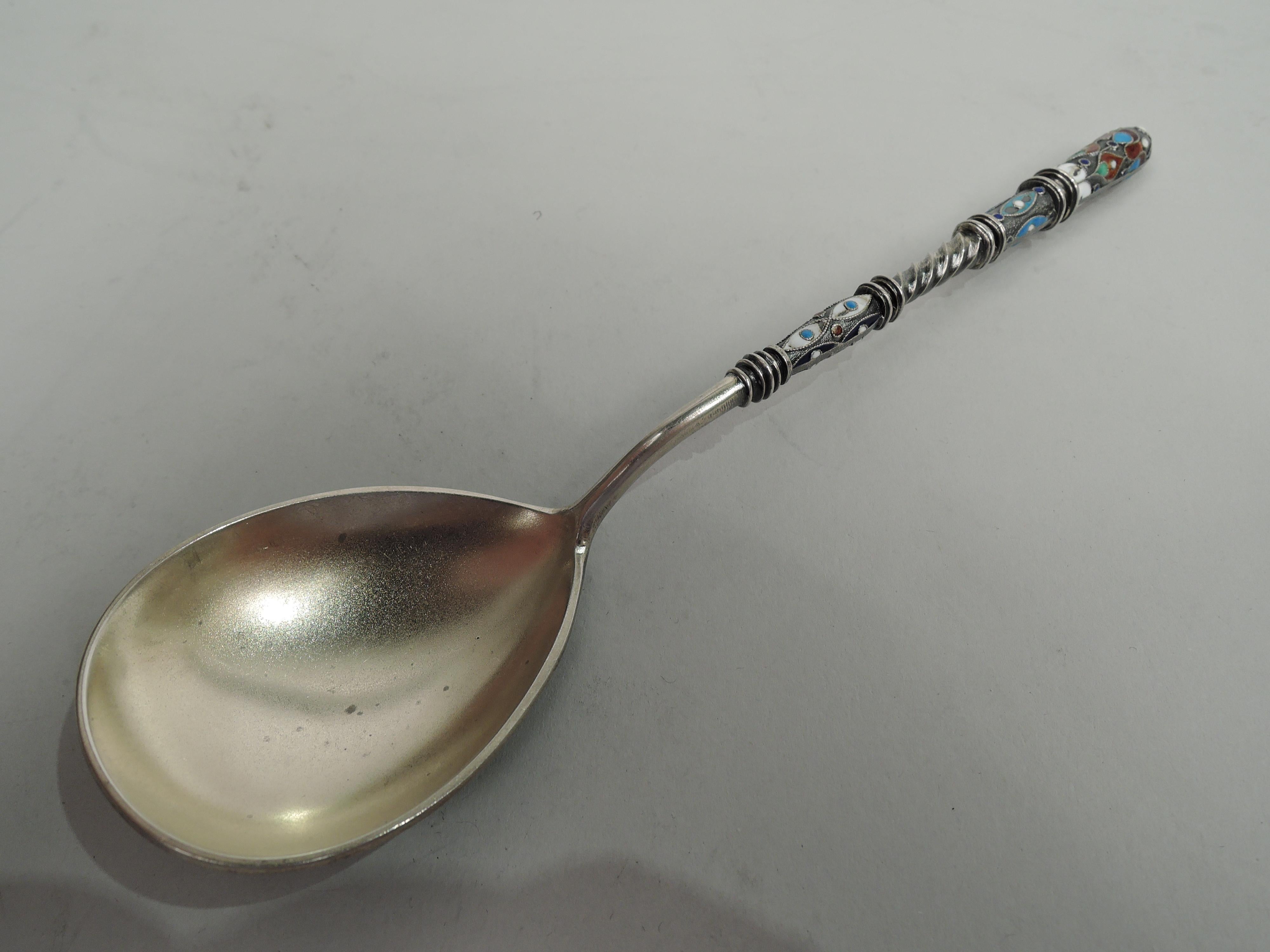 Scandinavian Arts & Crafts silver gilt and enamel spoon. Made by Marius Hammer, circa 1930. Twisted and knopped shaft and oval bowl. Stylized enameled ornament, including flowers, scrollwork, and beading, on shaft and bowl verso. Fully marked “900”