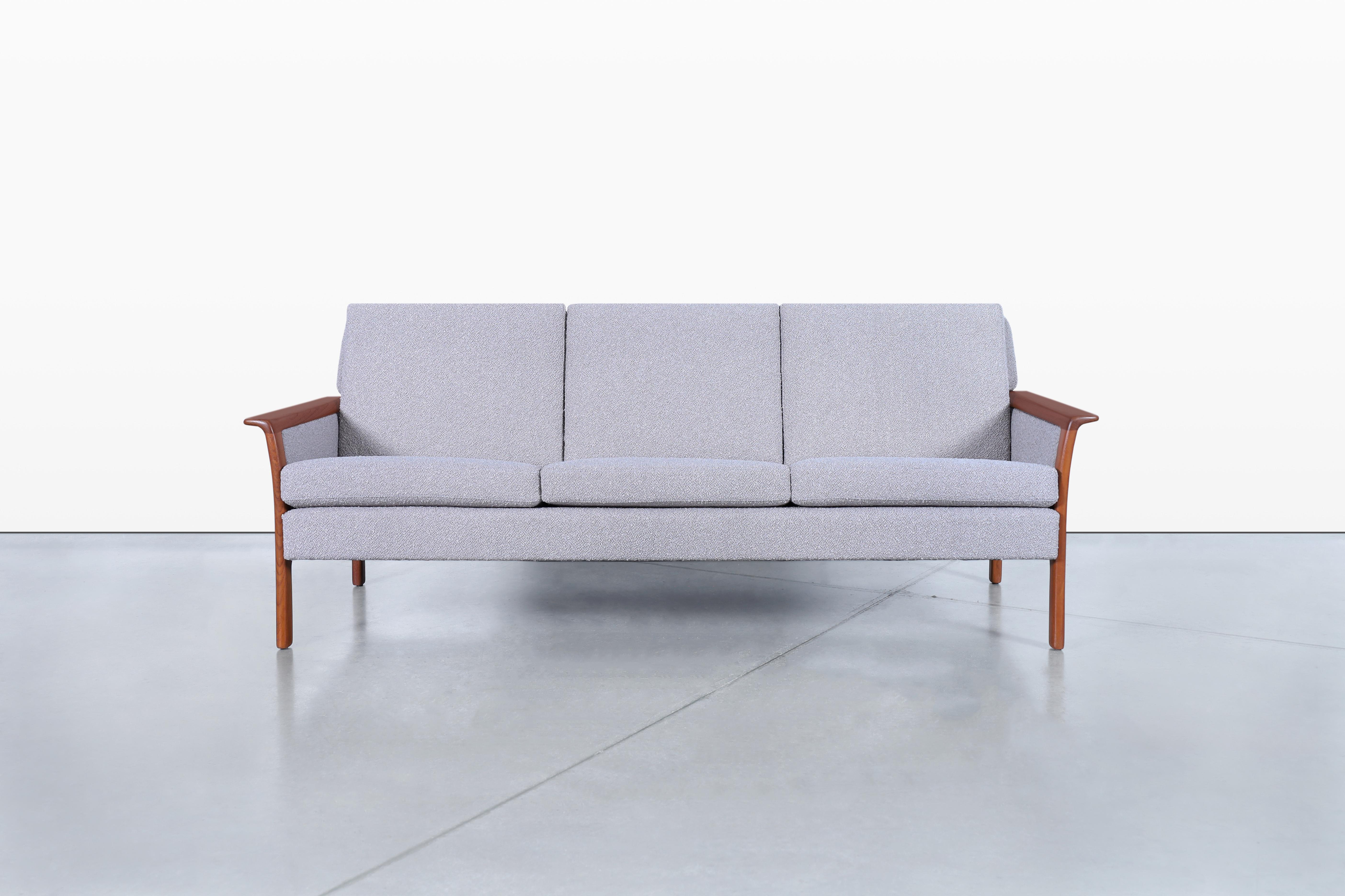Presenting a stunning vintage teak sofa attributed to the renowned designer Fredrik Kayser for Vatne Mobler, hailing from Norway in the 1970s. This exquisite piece features a beautifully crafted solid teak frame that showcases subtle curves, exuding