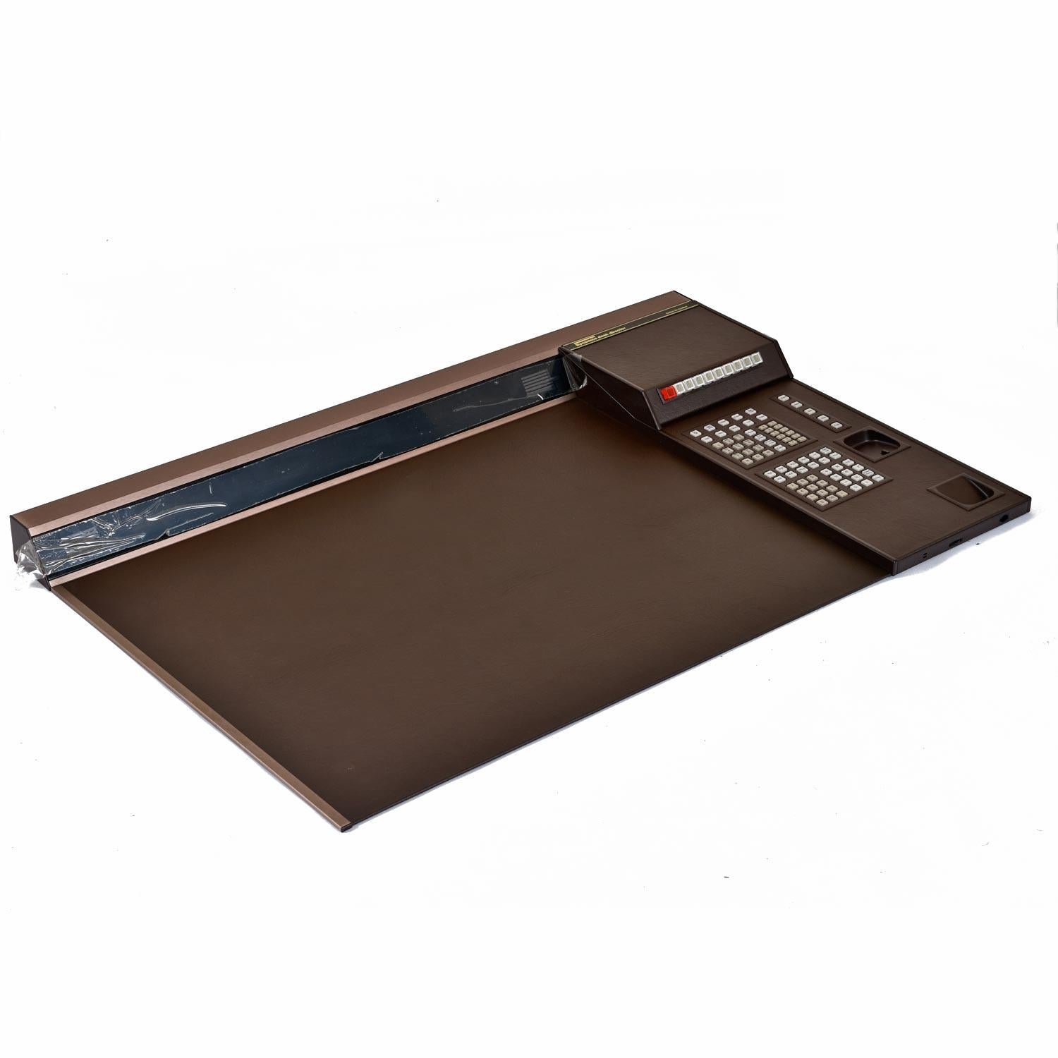 No status seeking, 1980s Wall Street executive should be without this leather bound desk apprentice. More than just a novelty item, this is a rare piece of tech and design history. If you can't afford a DeLorean, this desk director is the next best