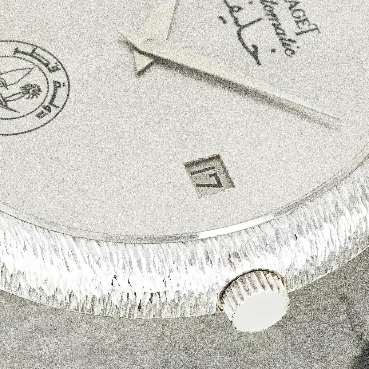 A rare vintage Piaget wristwatch crafted in 18k white gold, reference 13342 A6. Featuring a silver dial signed Piaget at 12 o’clock with Khalifah engraved below in Arabic, and the Qatar crest at 6 o’clock. A date aperture is positioned at 3 o’clock,