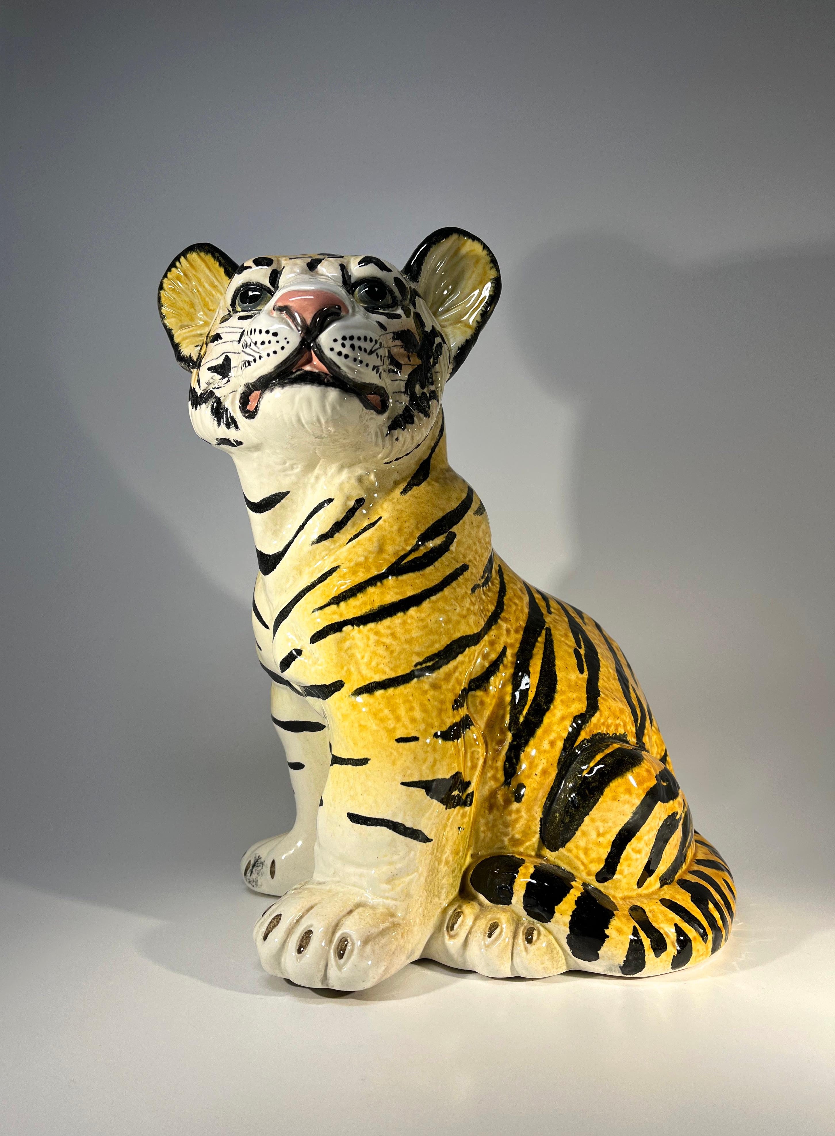 Undeniably appealing, Italian retro ceramic tiger cub from the 1960's
Hand painted and glazed, vibrant and striking
Circa 1960's
Signed Italy
Height 10 inch, Width 8 inch, Depth 6 inch
In excellent condition
Wear consistent with age and use