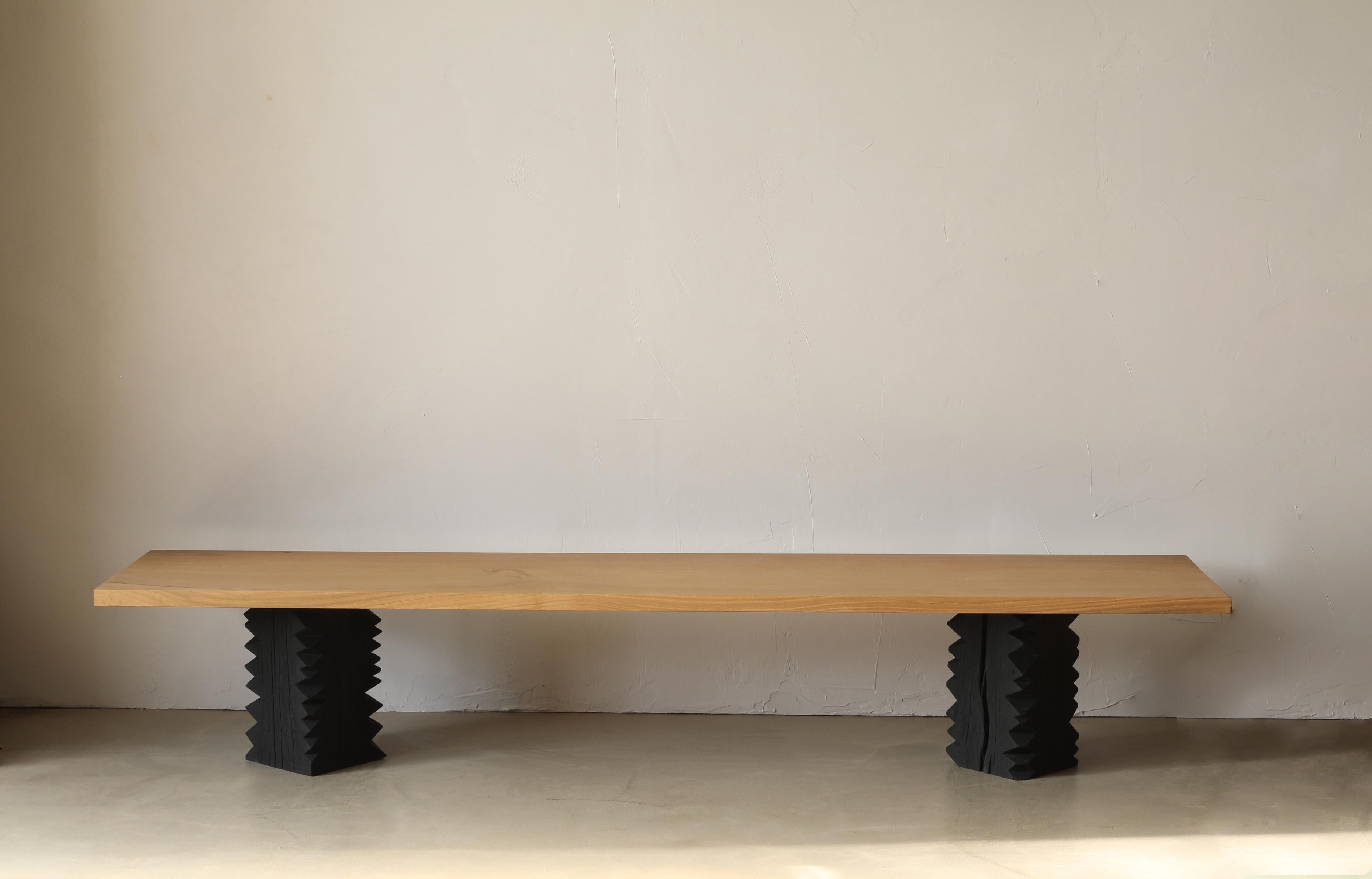 Notch II is a 16-inch tall bench. The clean and simple benchtop plays off the jagged legs. The Notch collection finds its foundation in ‘cribbage’,  a rough-cut lumber used to build support structures called ‘cribs’ in coal mines. This material