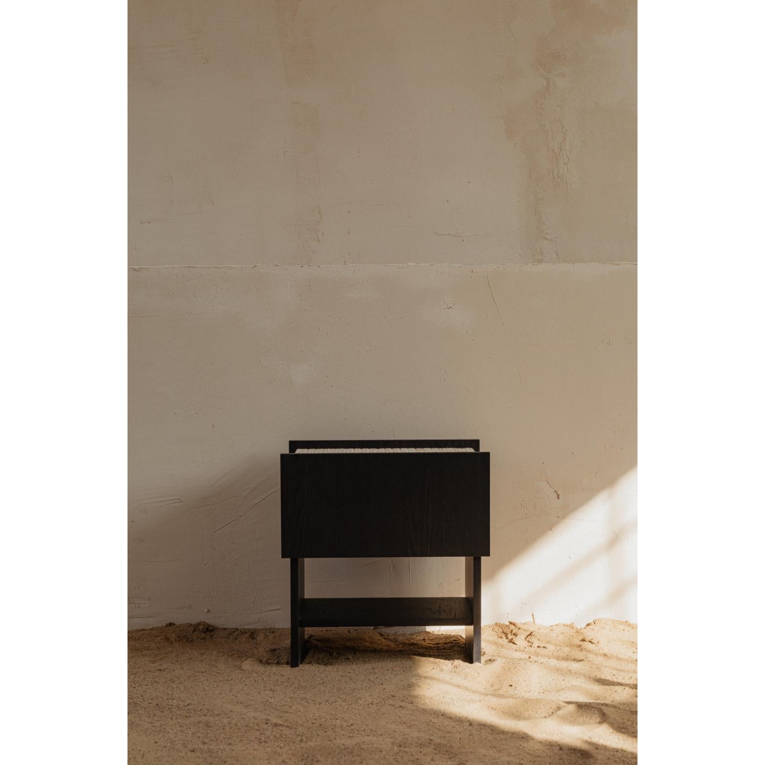 Noto Bedside Table by Un’common
Designed by Małgorzata Korycka.
Dimensions: D 36,5 x W 50 x H 54 cm.
Materials: Graphite oak and travertine.

Available in different finishes and materials. Please contact us.

The Noto nightstand from the LINEE