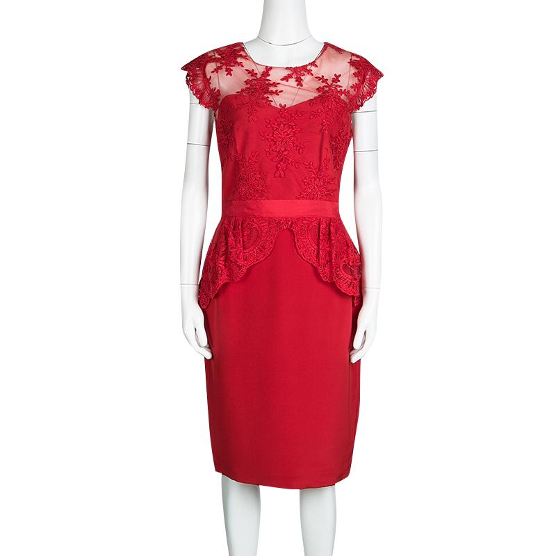 Notte By Marchesa's scarlet red peplum dress will be one of the most stylish additions to your closet. The bodice features a red embroidered lace overlay, and the fitted waist displays the peplum design. The dress is partially sheer at the rear and