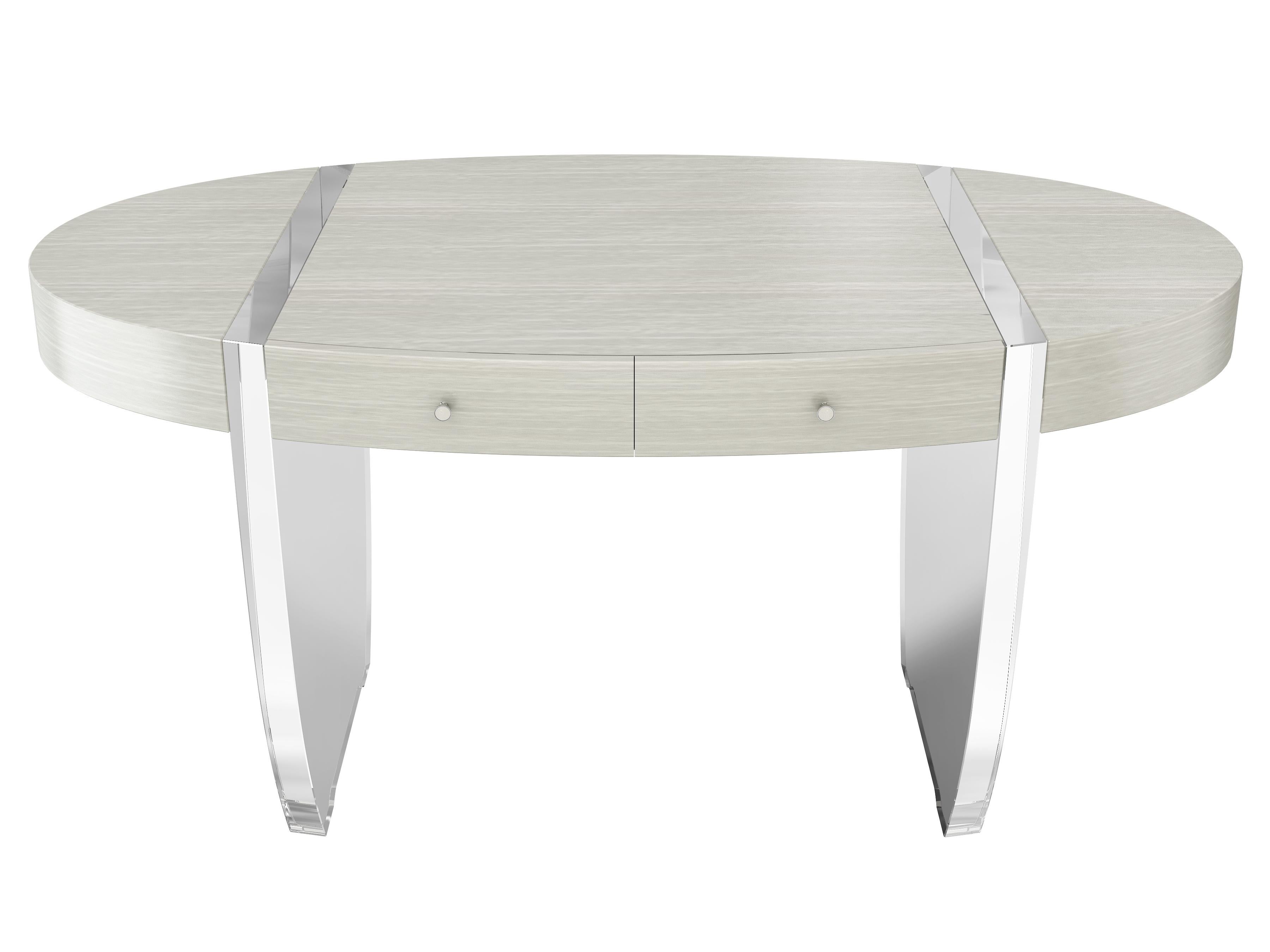 Modern Oval Desk - an elegant modern classic designed by Jonathan Franc - the oval top over a conforming frieze with two drawers, each opening to fitted drawer box interiors with cream colored ultra-suede lined pull out trays, all raised on two