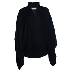 Nouredinne Amir, black wool cape