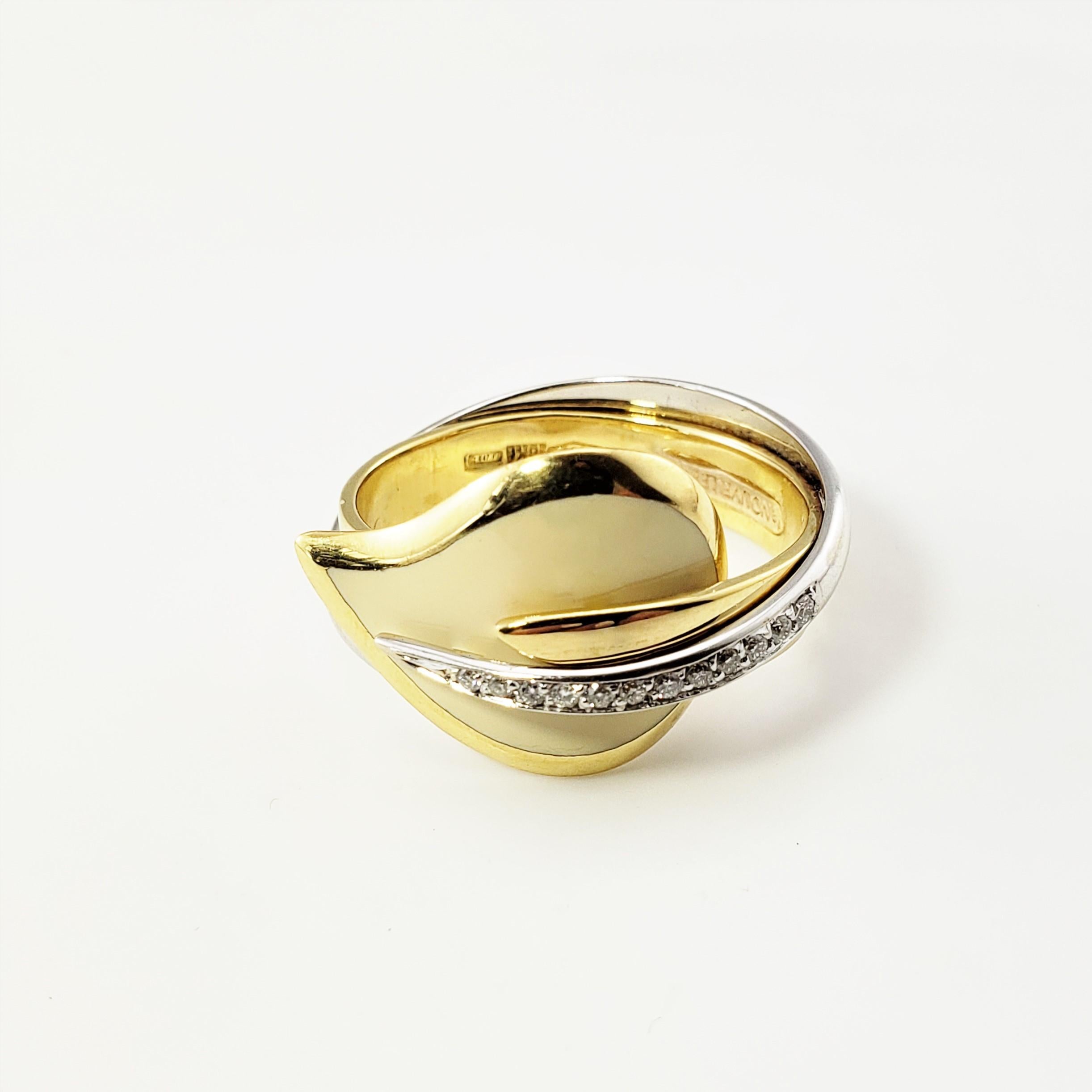 18 Karat Yellow/White Gold Nouvell Bacue Enamel and Diamond Calla Lily Ring Size 8-

This elegant calla lily ring is accented with cream enamel and 12 round brilliant cut diamonds set in beautifully detailed 18K yellow and white gold.  Width: 14 mm.