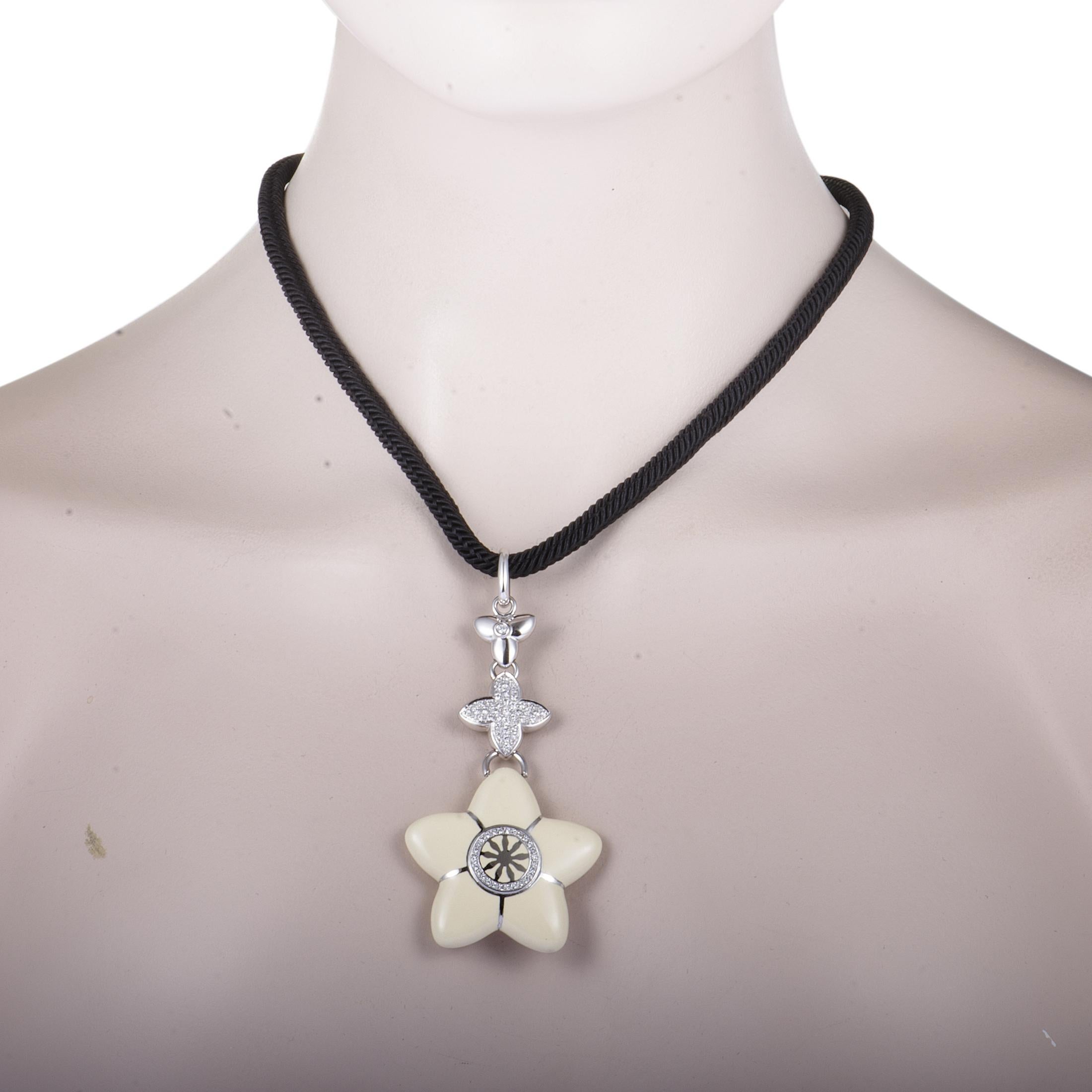 Accentuate your look in an exceptionally gorgeous manner with this spectacular floral necklace by Nouvelle Bague that is attractively made from a luxurious combination of 18K white gold and sterling silver and beautifully decorated with 0.86ct of