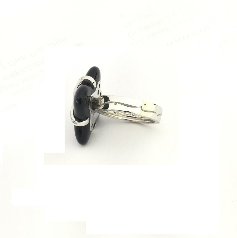Nouvelle Bague Black Onyx and Diamonds in 18k White Gold 
Diamonds 0.16 carat total weight 
Ring Size 7
A2234N