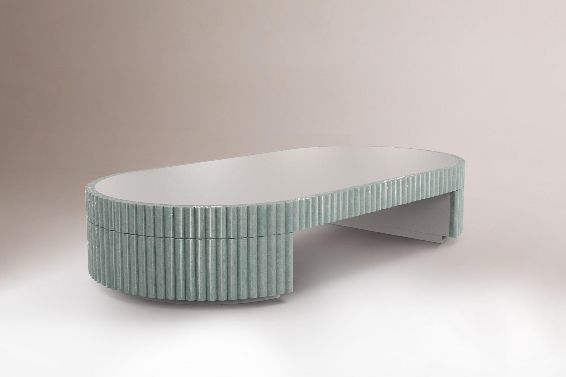 Nouvelle Vague center table by Dooq.
Measures: W 162 x D 82 cm x H 30 cm
Materials: Lacquered wood, Mar di Giava ceramic tiles.

Dooq is a design company dedicated to celebrate the luxury of living. Creating designs that stimulate the senses, whose