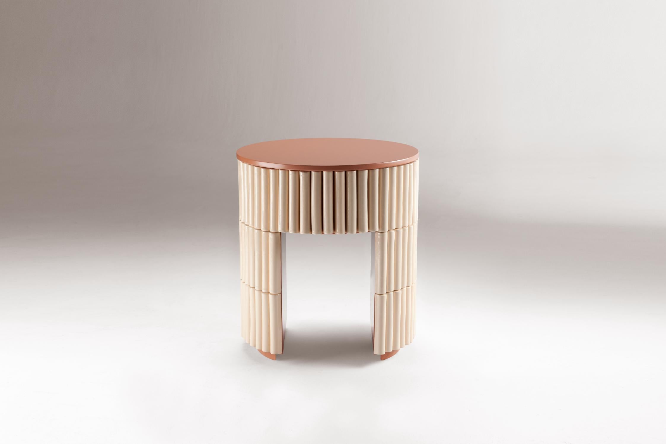 Nouvelle Vague Side Table by Dooq
Dimensions: ø 54 x H 37.5 cm
Materials: Off white mar di giava tiles, powder mate lacquered wood.


Dooq is a design company dedicated to celebrate the luxury of living. Creating designs that stimulate the senses,
