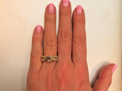 Nova 18 Karat Yellow Gold Emerald Cut and Baguette Diamond Ring